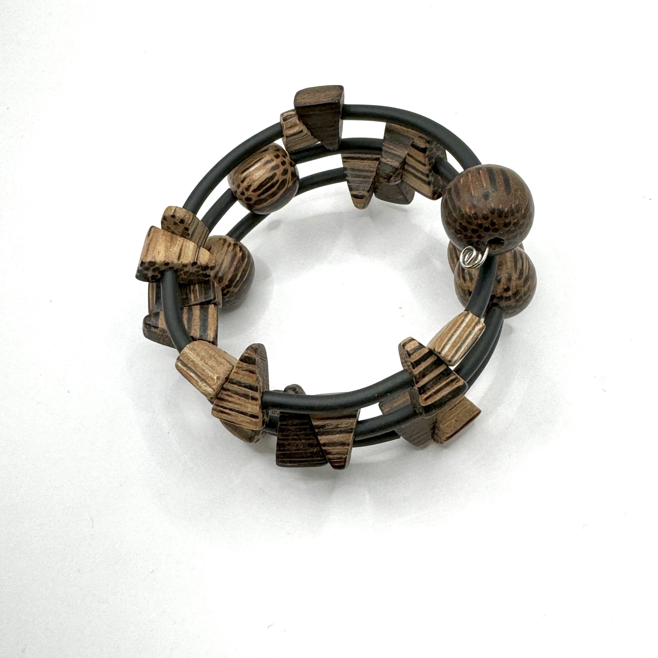 Shaped Wood Bead A coil of memory wire holds its shape for an easy to wear Memory Wire Bracelet.jpeg