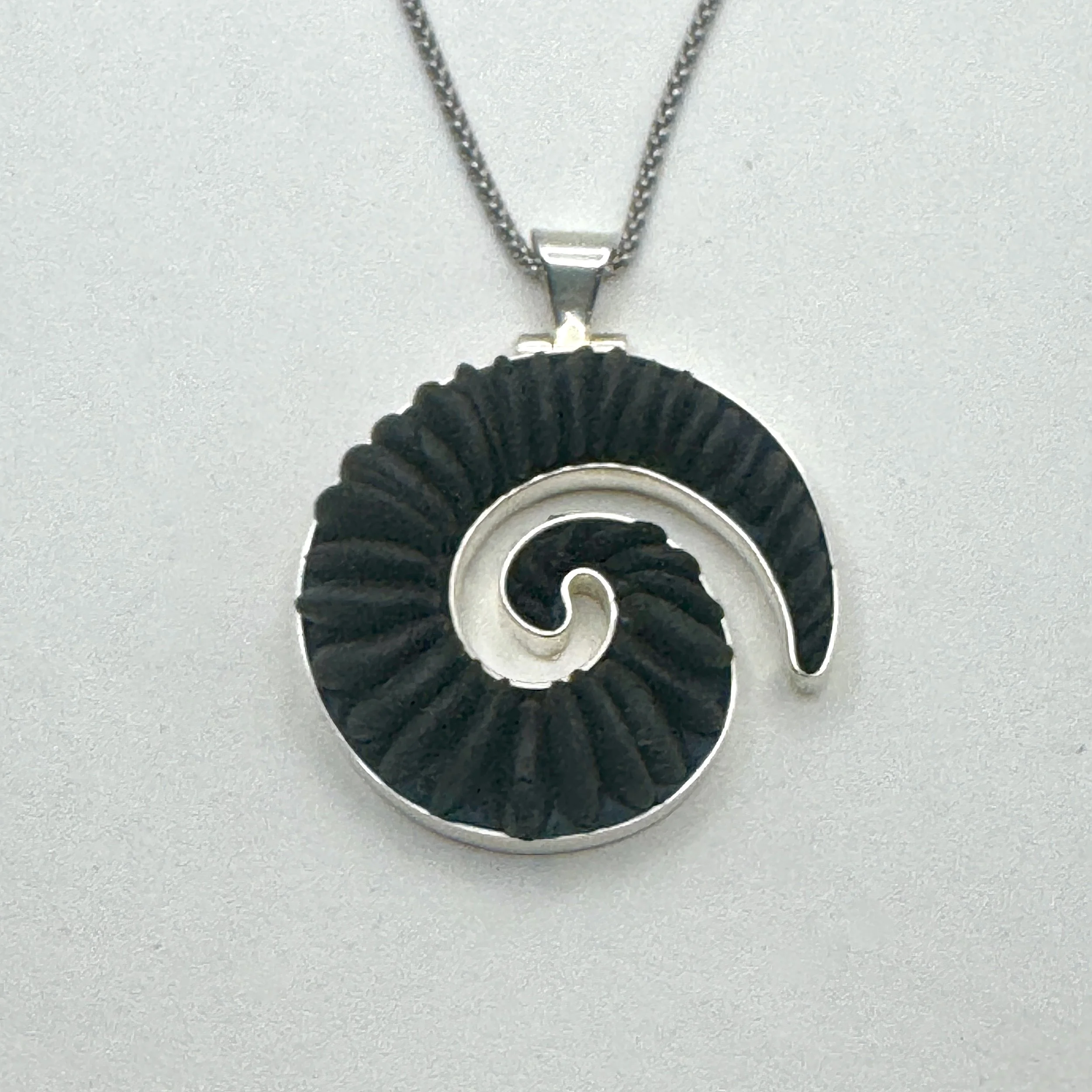 Small Black Koru Necklace.jpeg