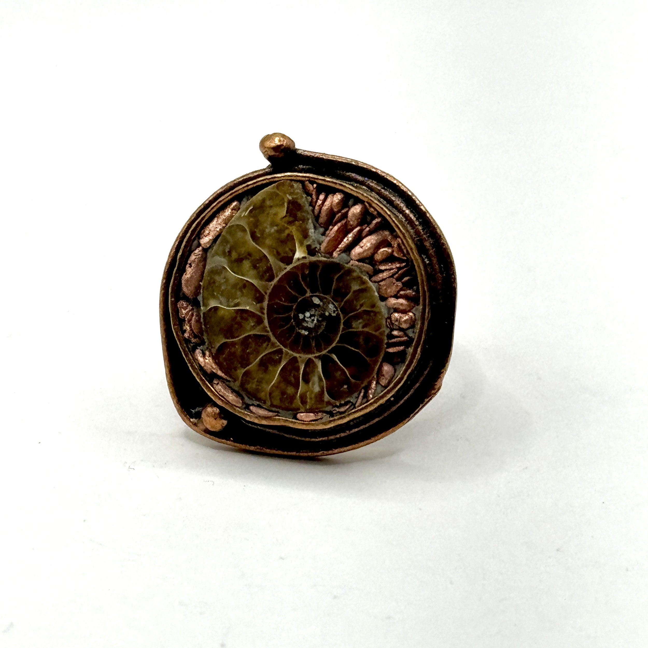 Ammonite Copper Circle Ring.jpeg