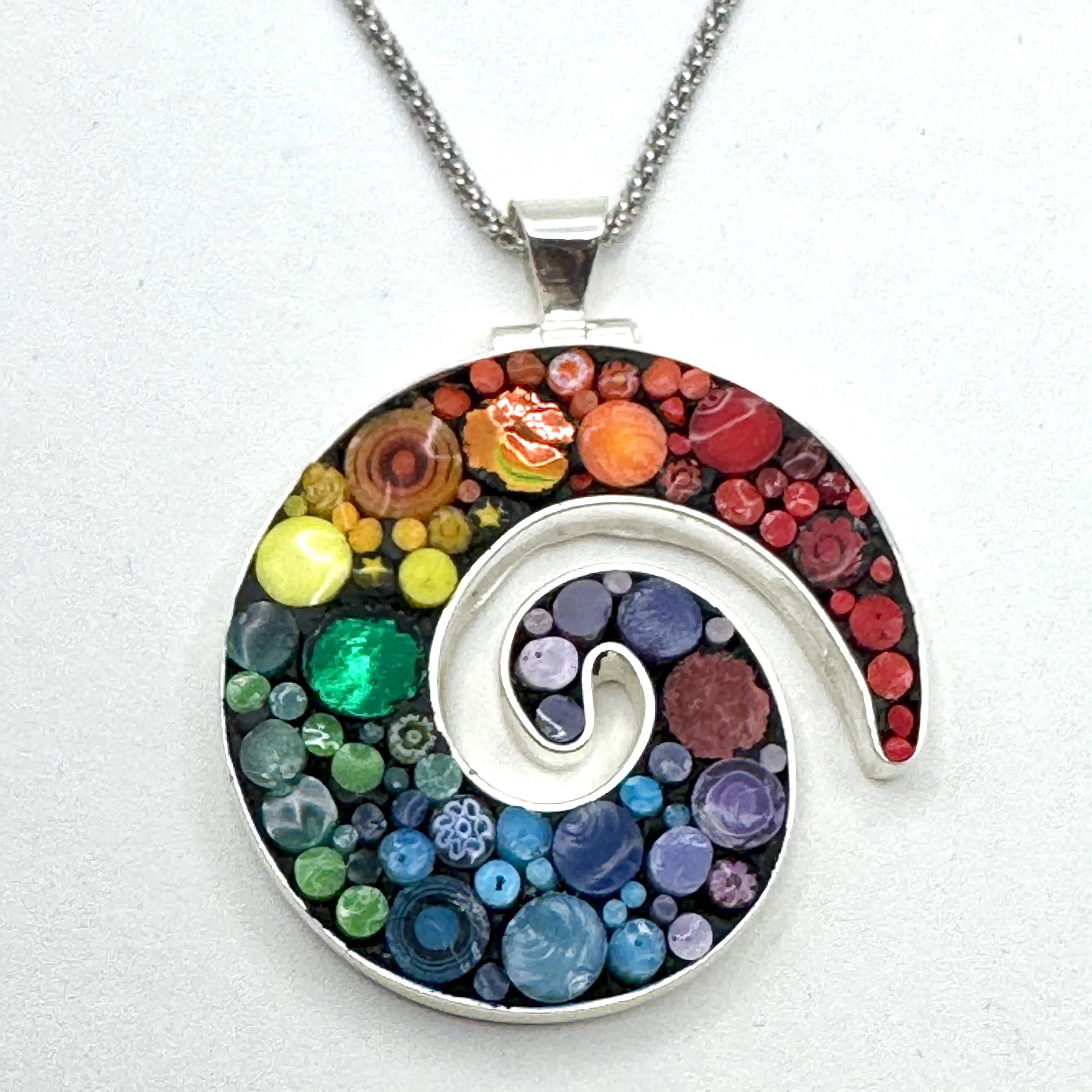 Rainbow Happy Dot Small Koru.jpeg