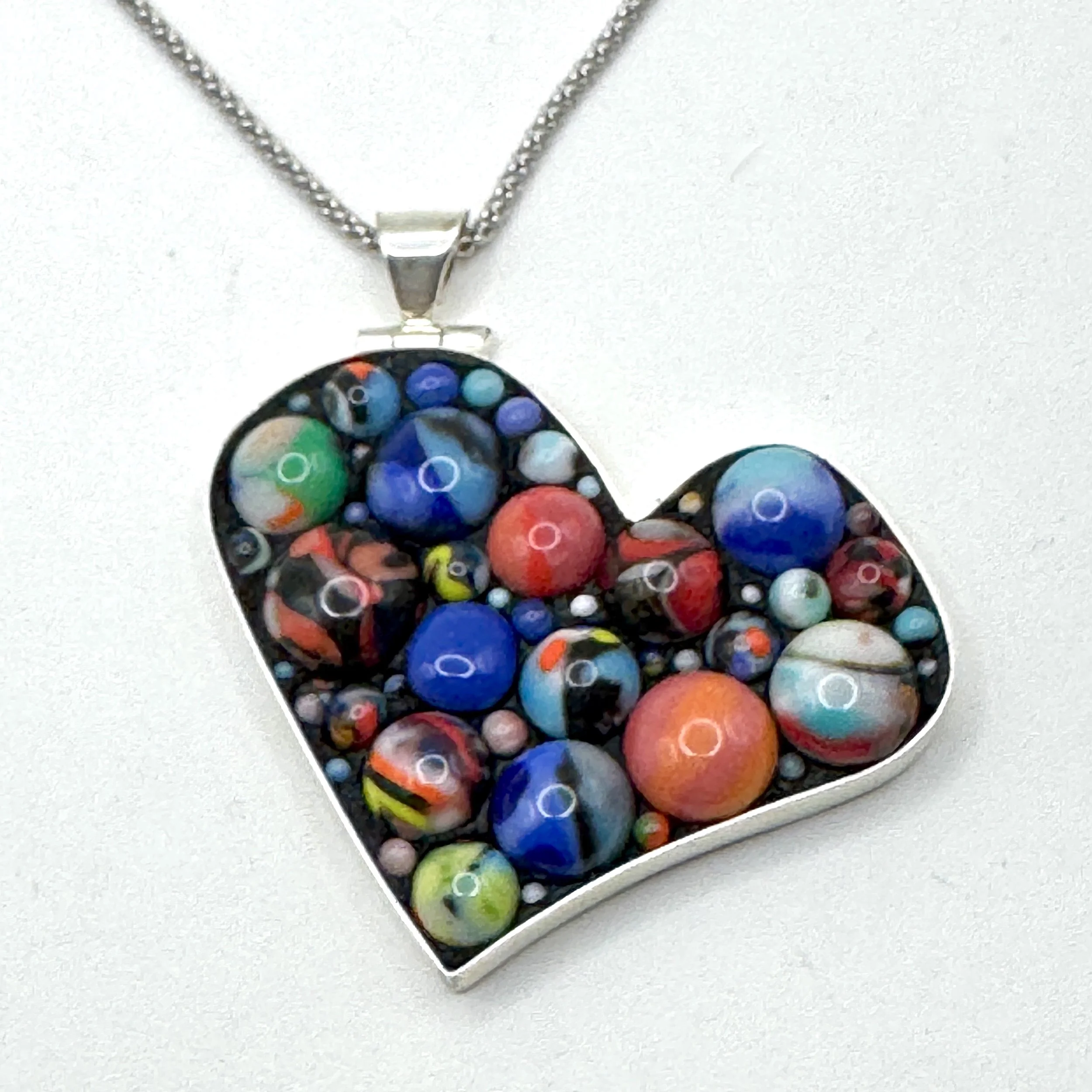 "Marbles" sideways heart necklace.jpeg