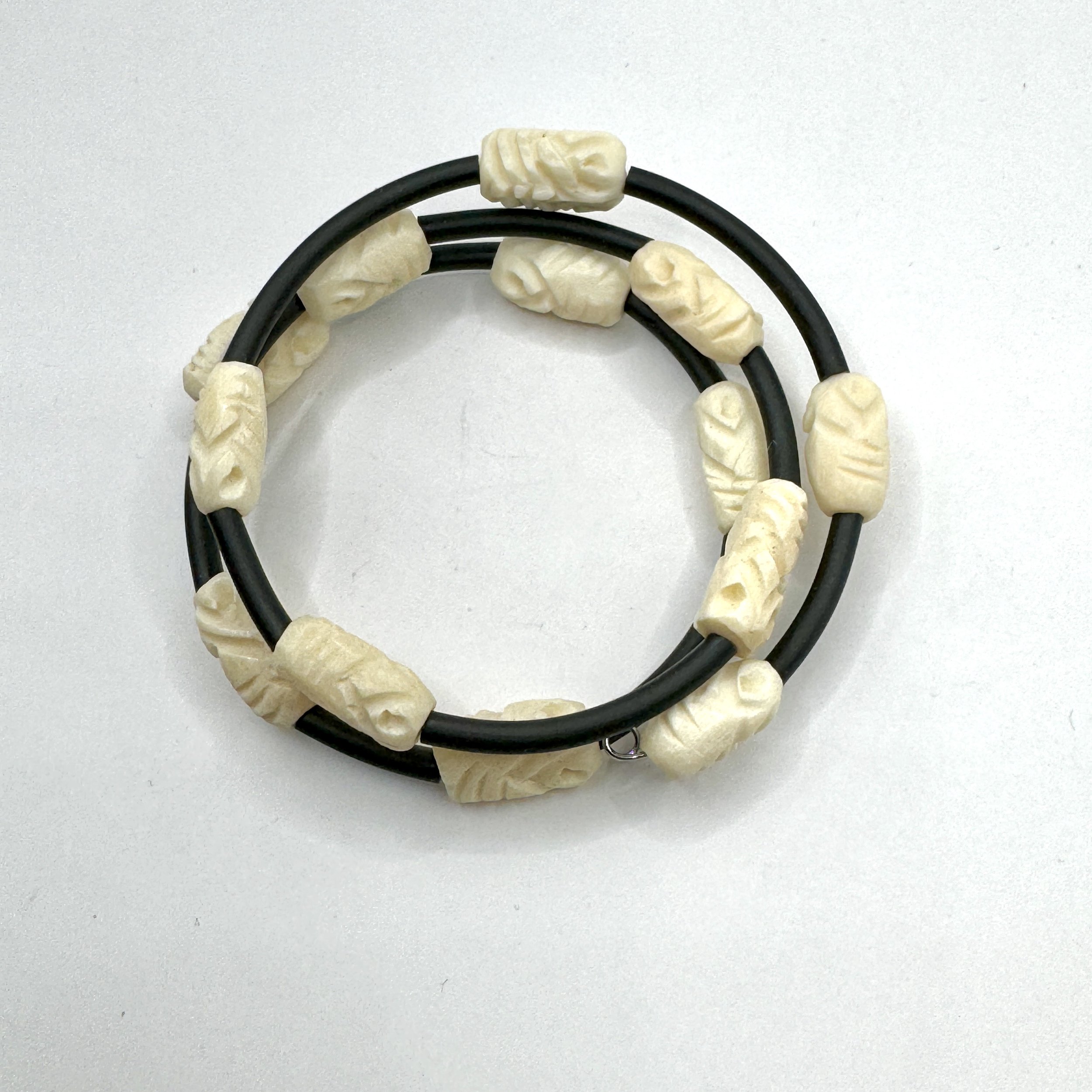 Carved Bone Bead Memory Wire Bracelet.jpeg