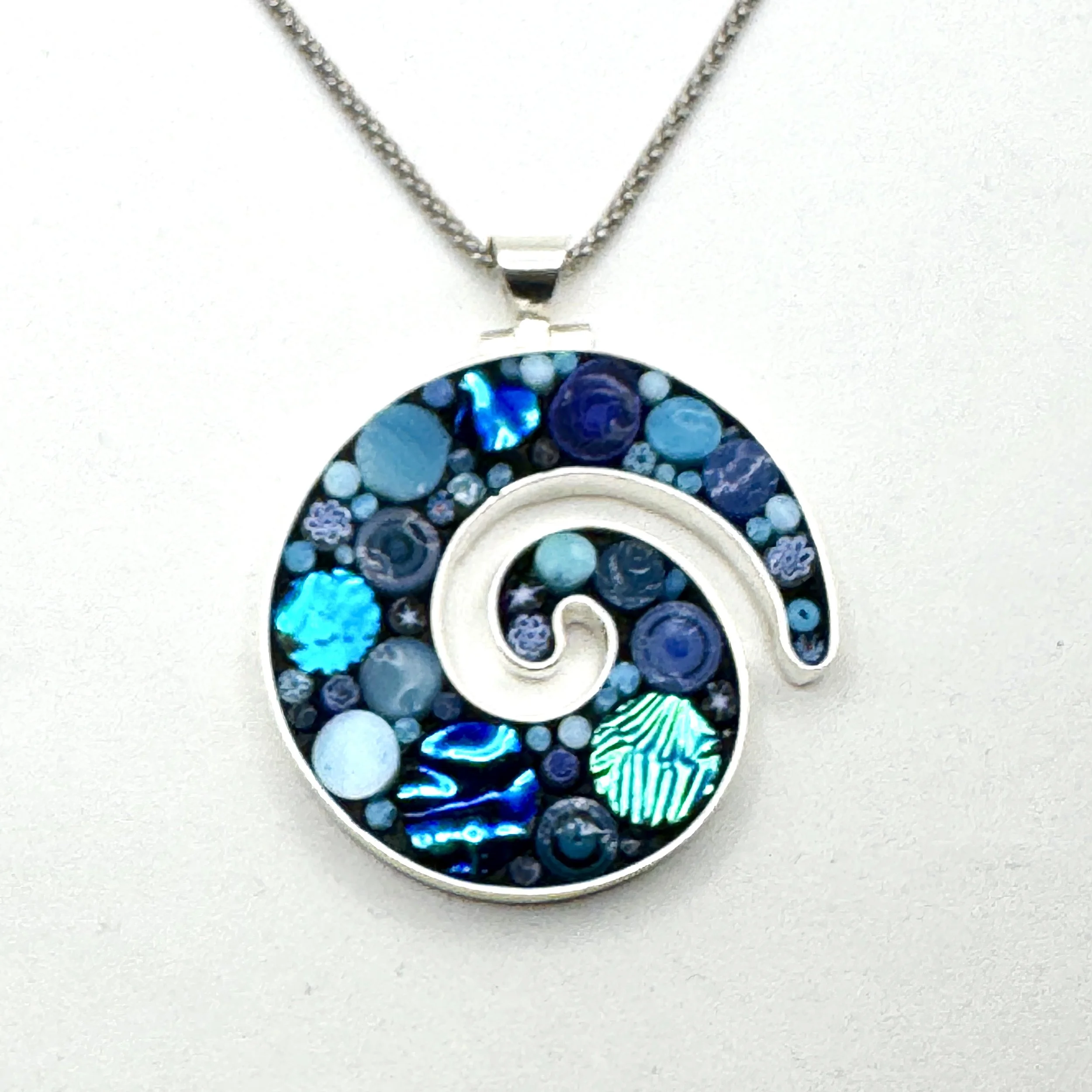 Blue Happy Dot Small Koru.jpeg