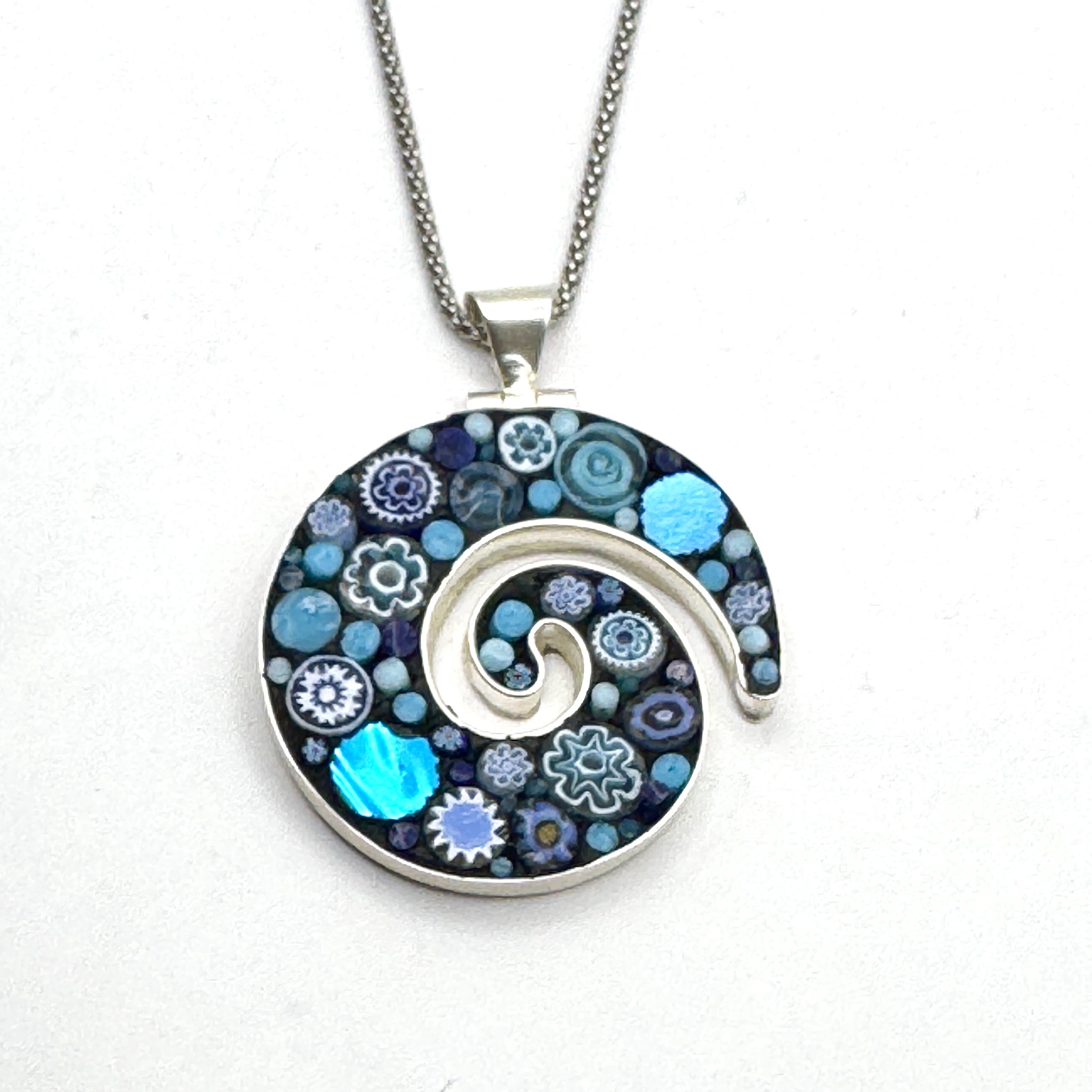 Blue dot small spiral.jpeg