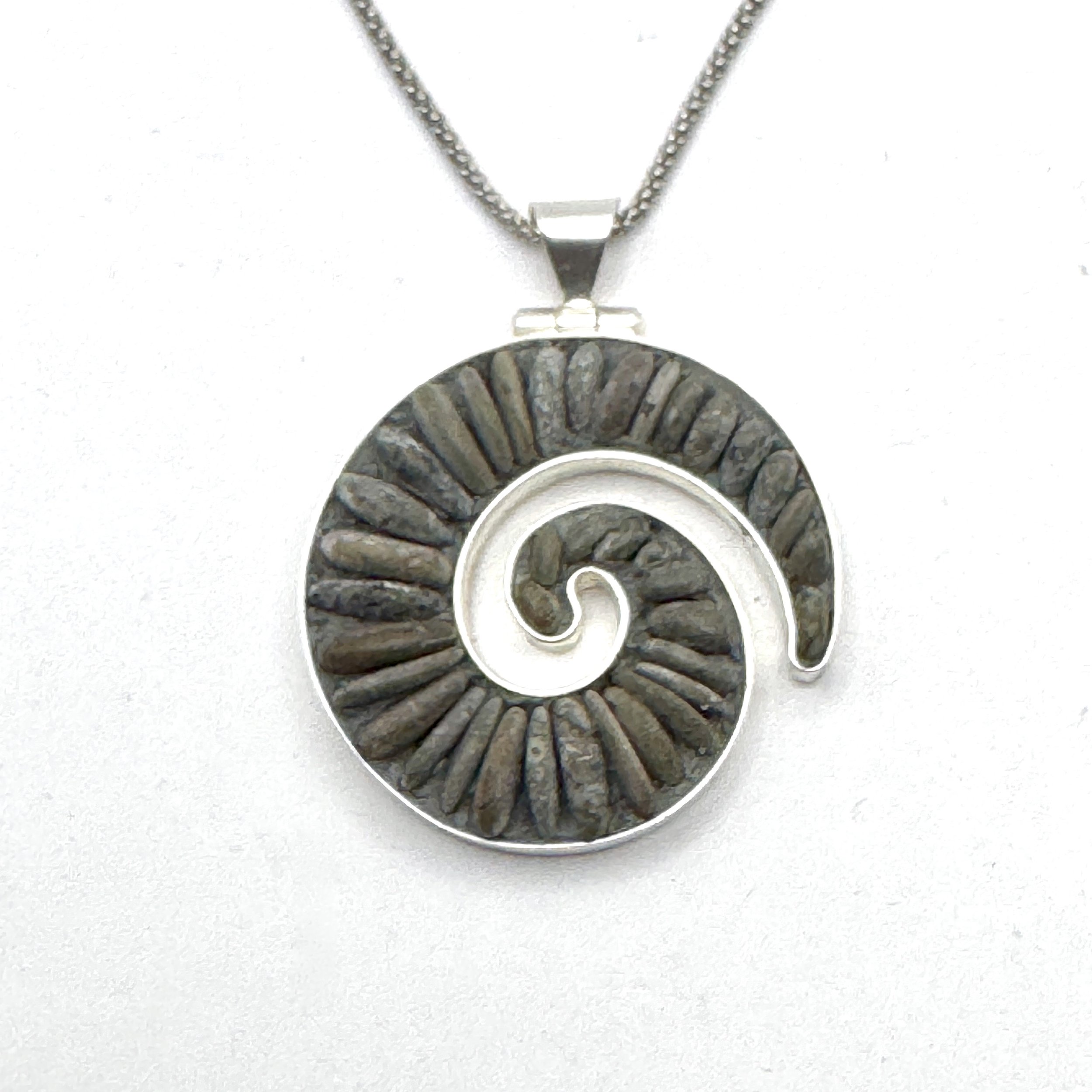 Pebble Koru - small.jpeg