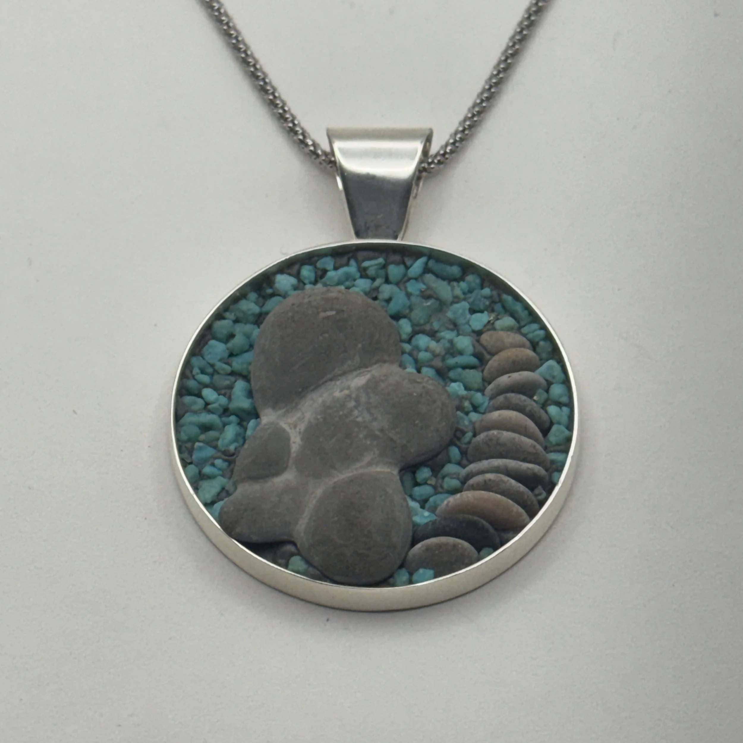 Goddess with Cairn Circle Necklace.jpeg