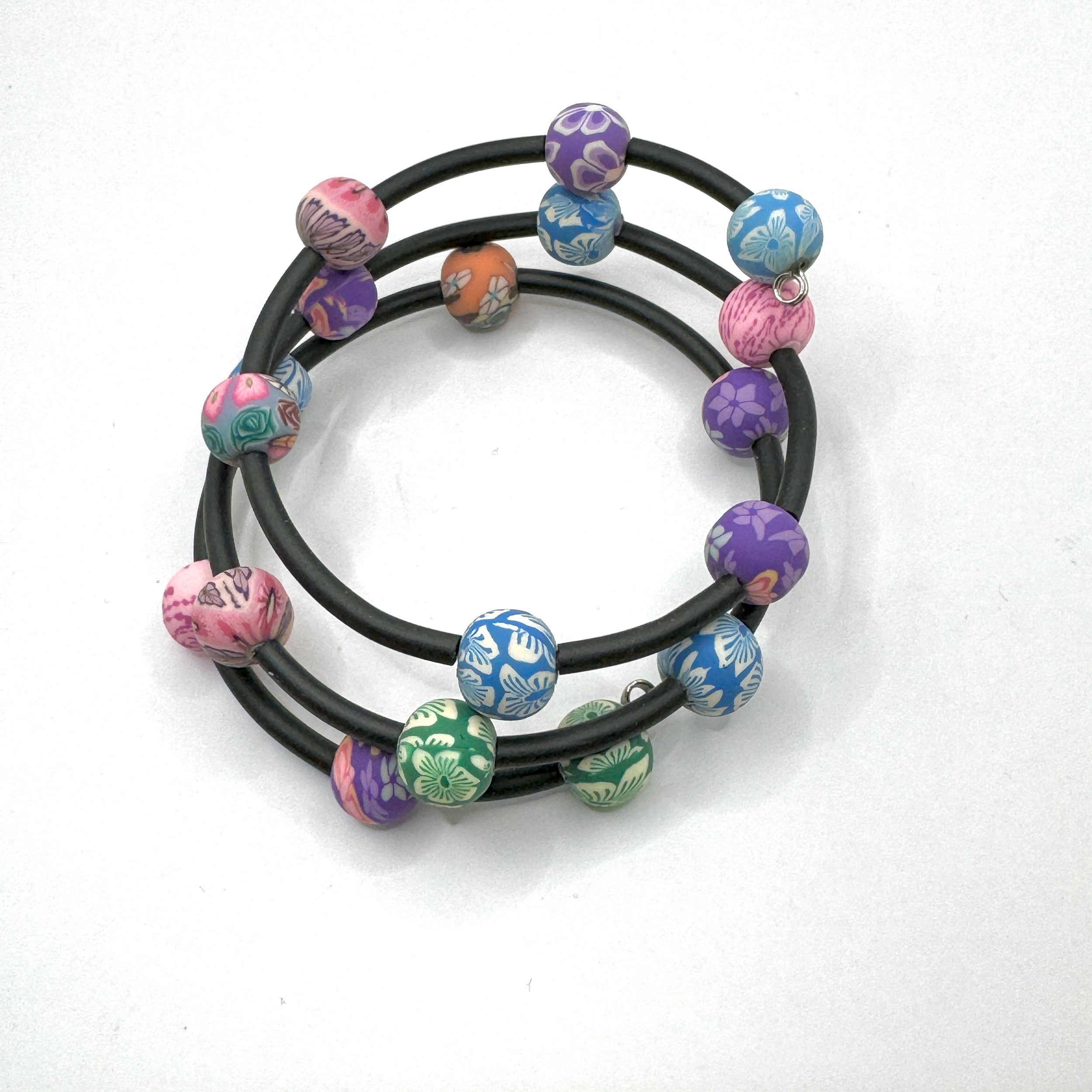 Multi Flower Polymer Bead Memory Wire Bracelet.jpeg