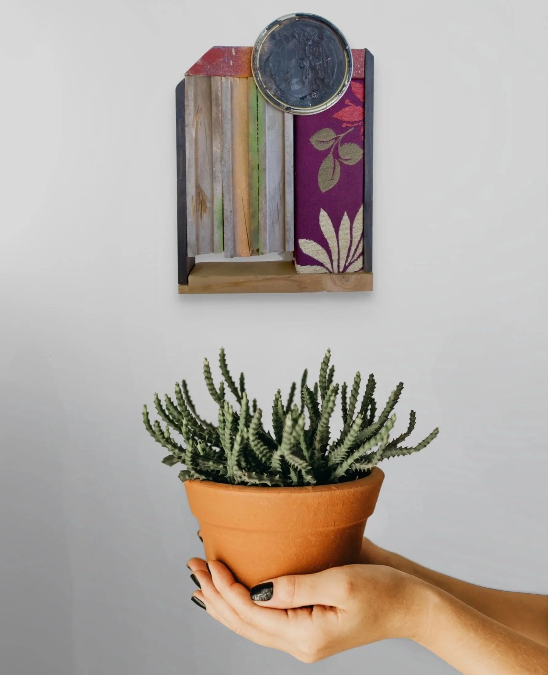 An abstract sculpture featuring organic pattern and timber