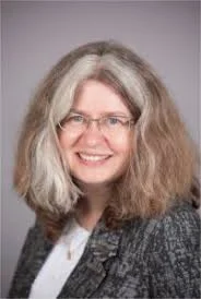 Enhancing Interprofessional Palliative Care Teams:  Mentors and Role Models for Whole-Person Care