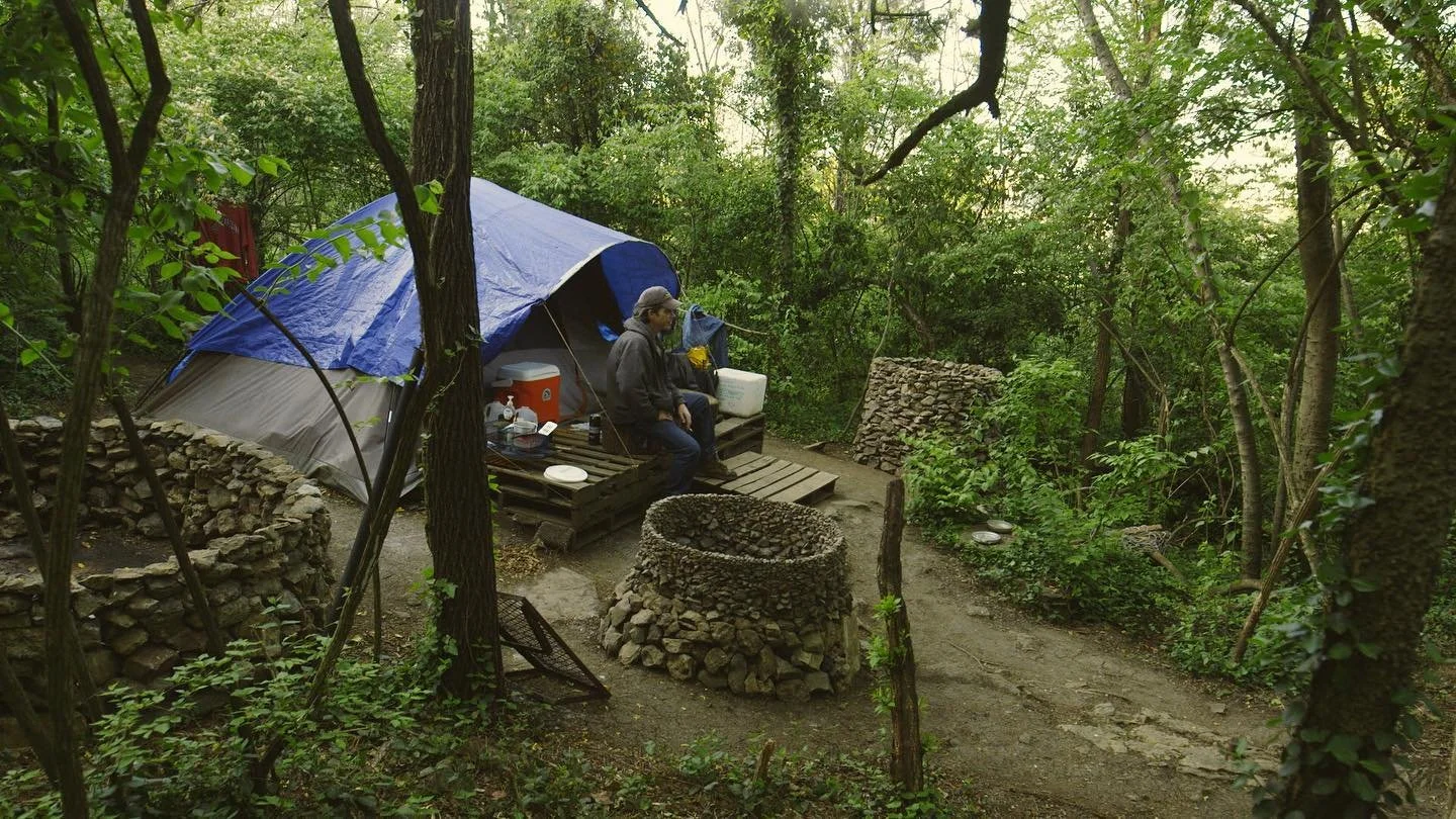 Jim sits on his porch located off a path between the micro communities &ldquo;the Gulch&rdquo; and &ldquo;Far Point Station.&rdquo; He is surrounded by his handcrafted fire pits with their stones held together by nothing, but gravity. #saintcloudhill