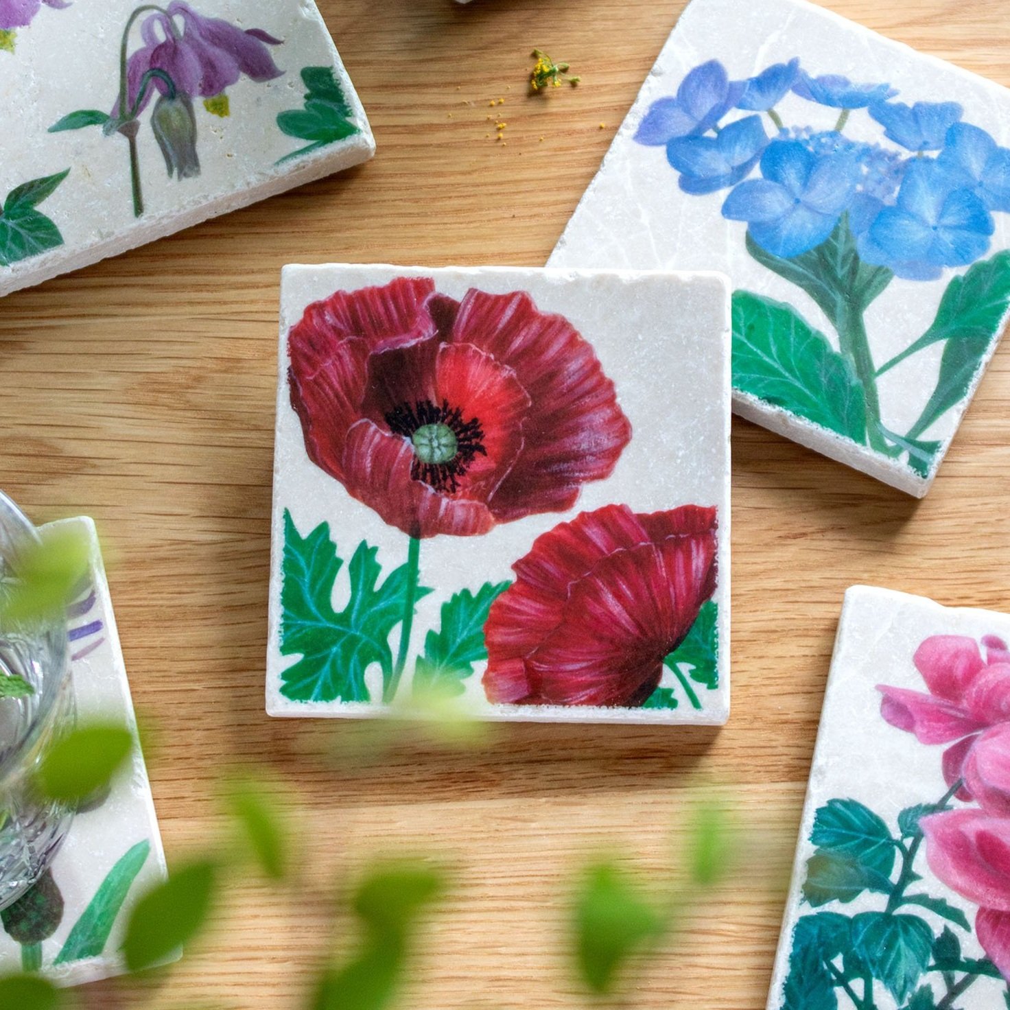 Garden+Coasters-on+wooden+table-poppy+focus.jpg