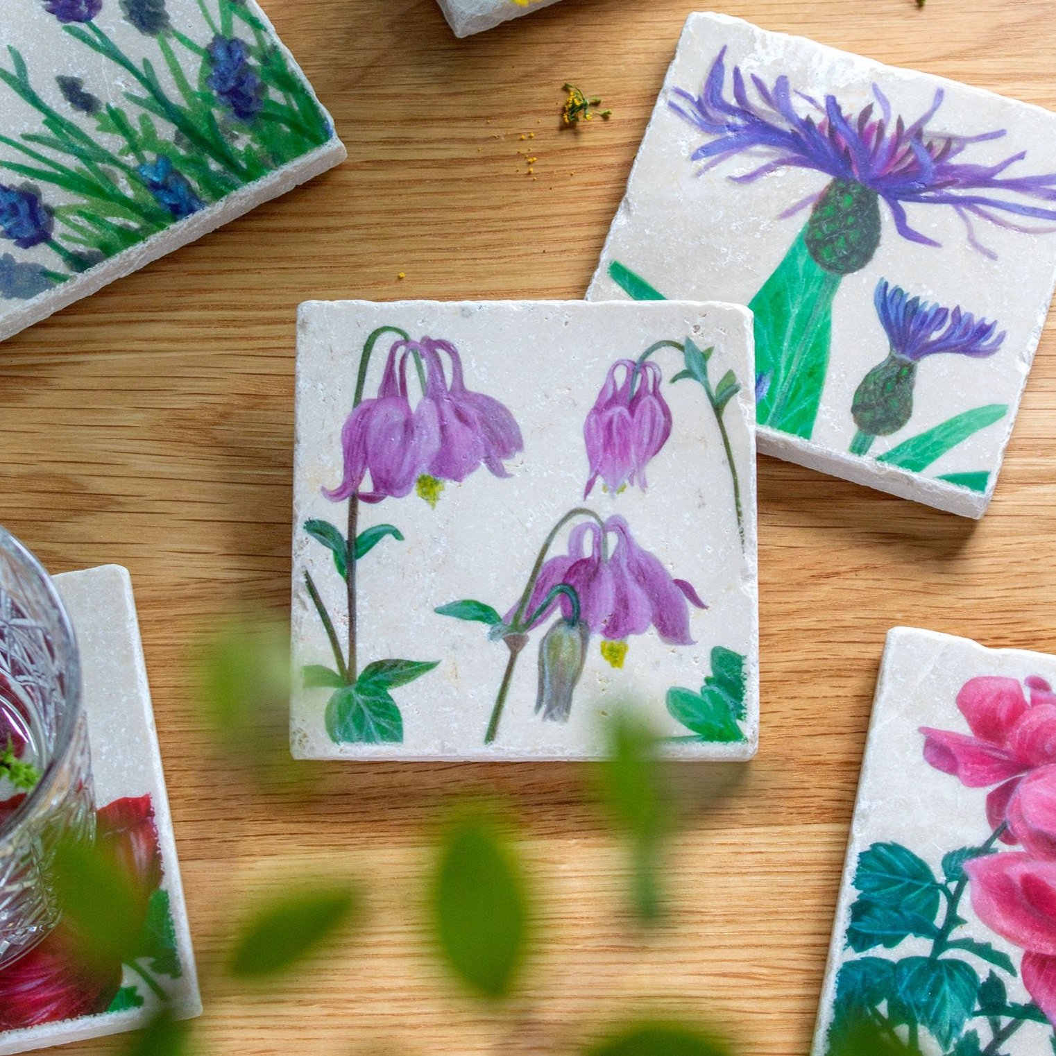 Garden+Coasters-on+wooden+table-columbine+focus.jpg