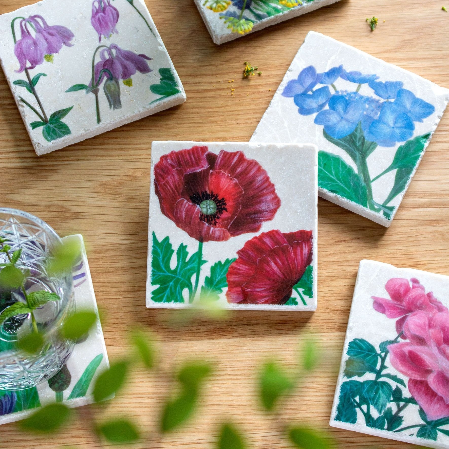 Garden+Coasters-on+wooden+table-poppy+focus.jpg