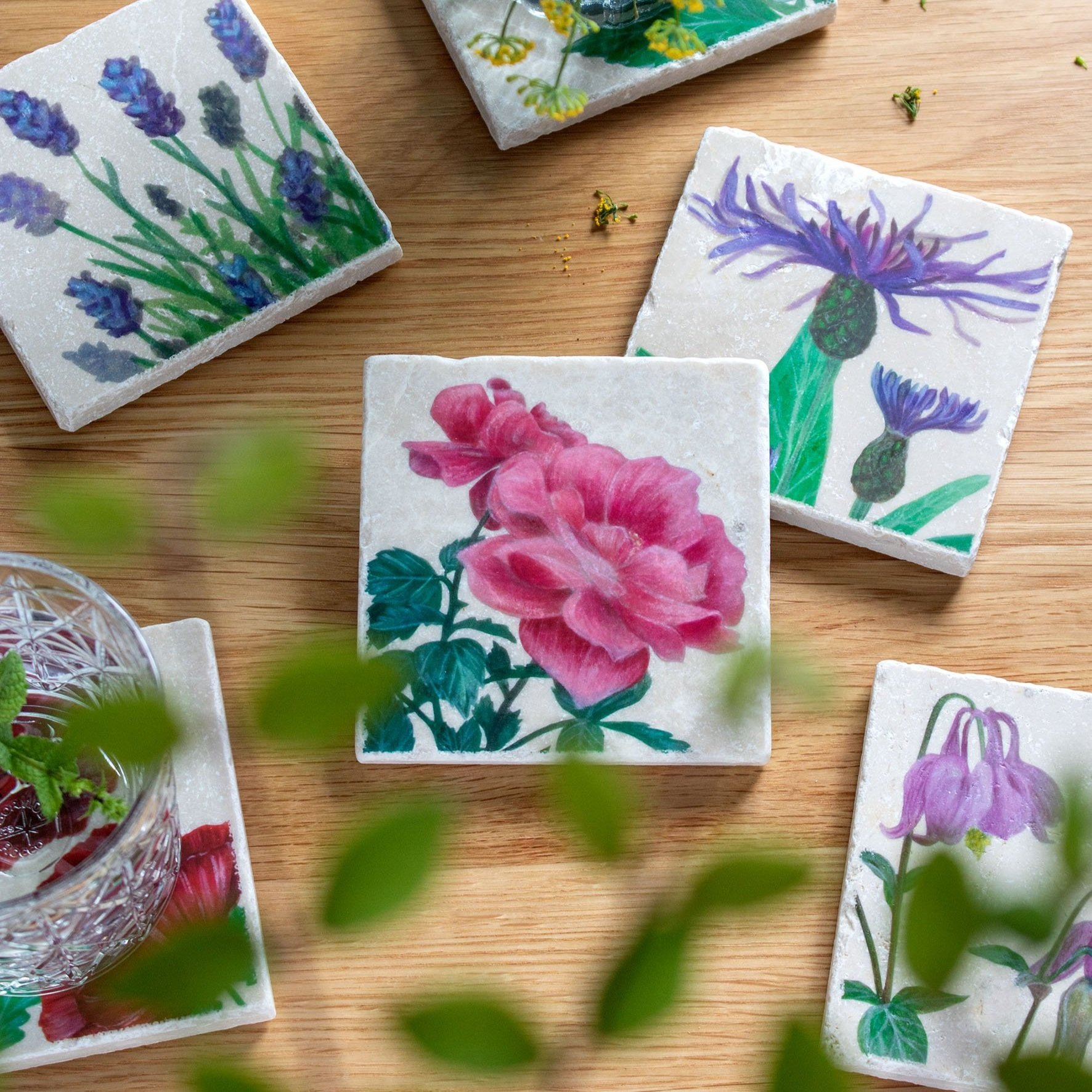 Garden+Coasters-on+wooden+table-rose+focus.jpg