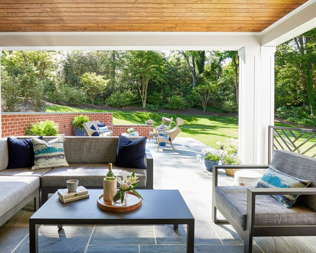 Sometimes it takes a village to create a view this good, and it all starts with a shared vision. Our clients requested a porch &amp; patio with both sheltered &amp; sunny spaces and a more level backyard for their kids to play in. Simple, right? The 