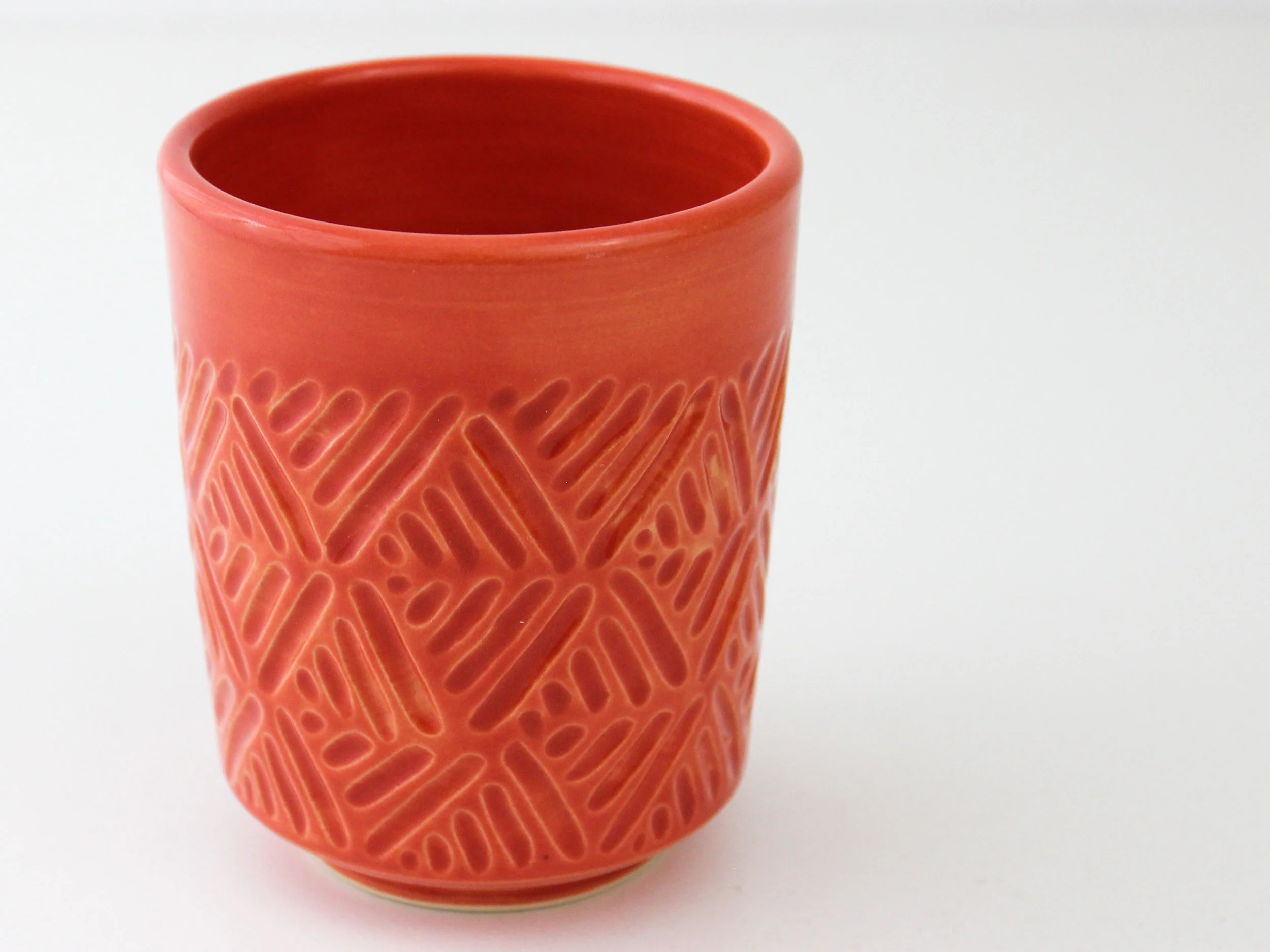 carved lines coral red three quarters.jpg