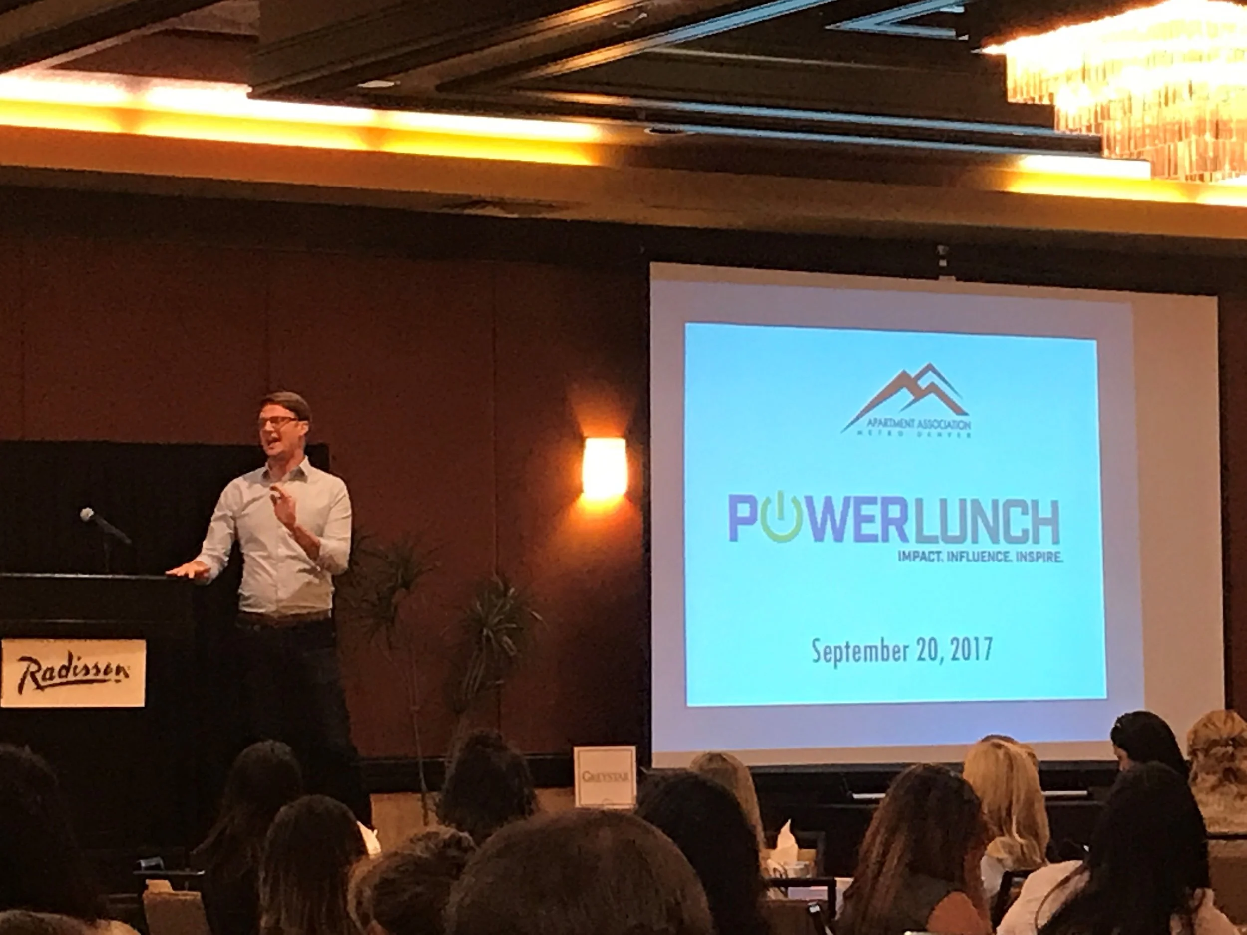 Ryan Avery presents at the Apartment Association of Metro Denver's September Power Lunch