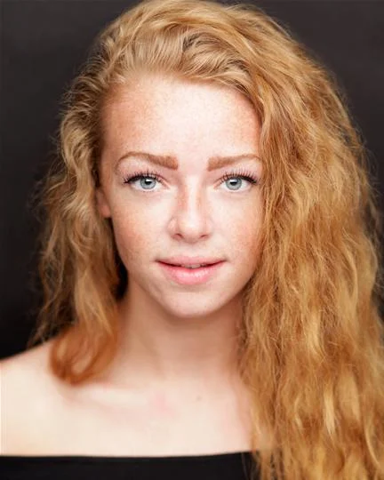 Abbi-Hodgeson-Main-Headshot.jpg