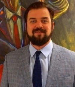 Tom Tauzin Headshot.jpg