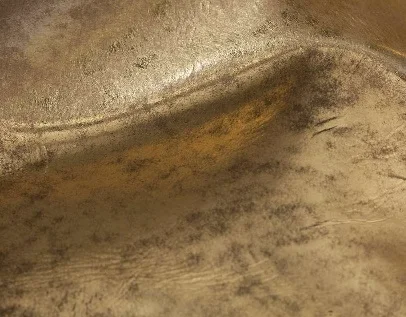 metallic leather In the category of semi aniline and corrected grain leather , finished with a metallic or pearl effect .
