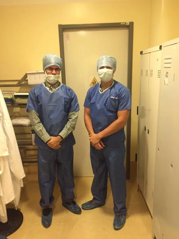 Kasey donning scrubs in preparation for the first day of shadowing.