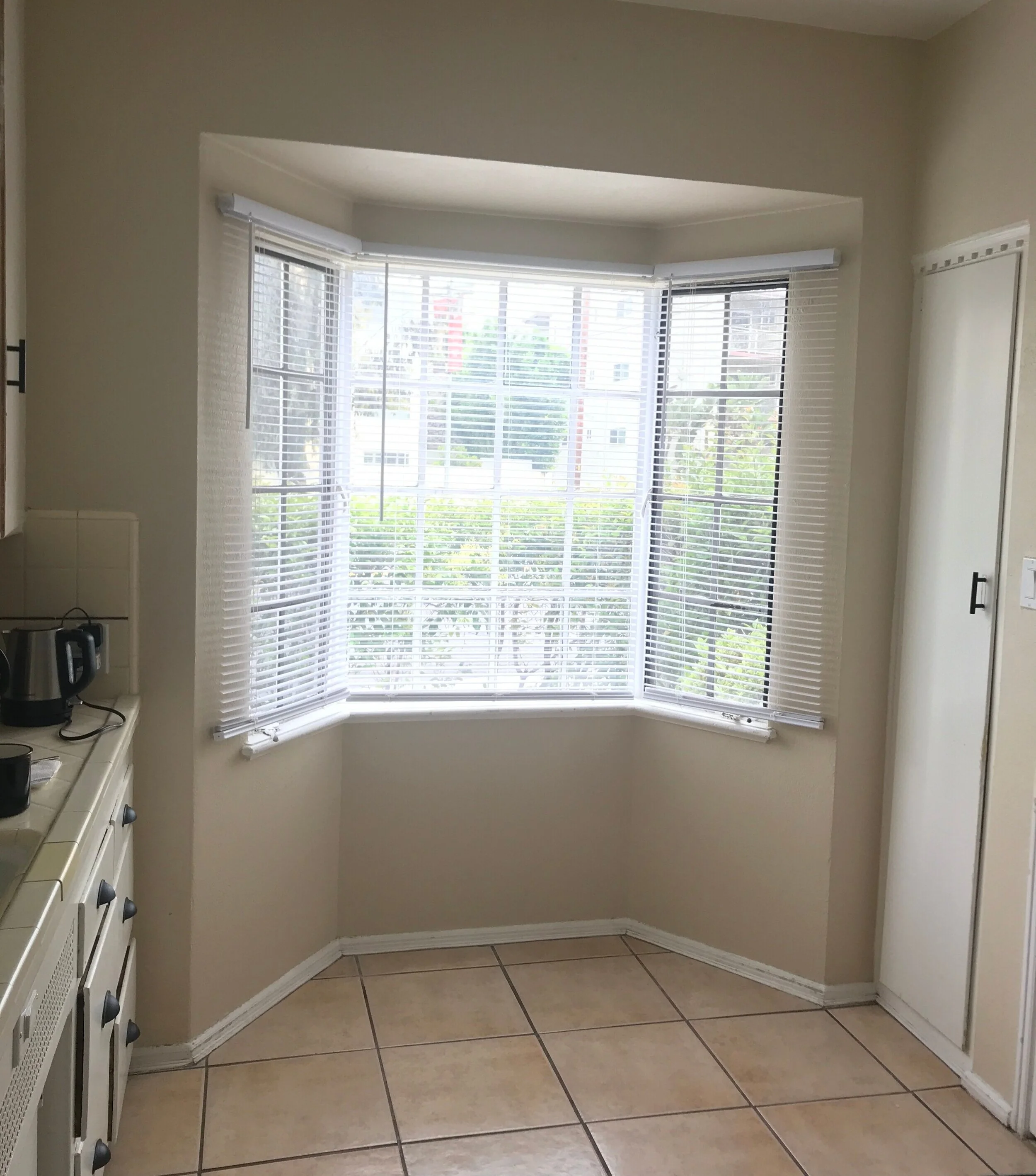 Before and After: New Bay Window with Built-In Blinds