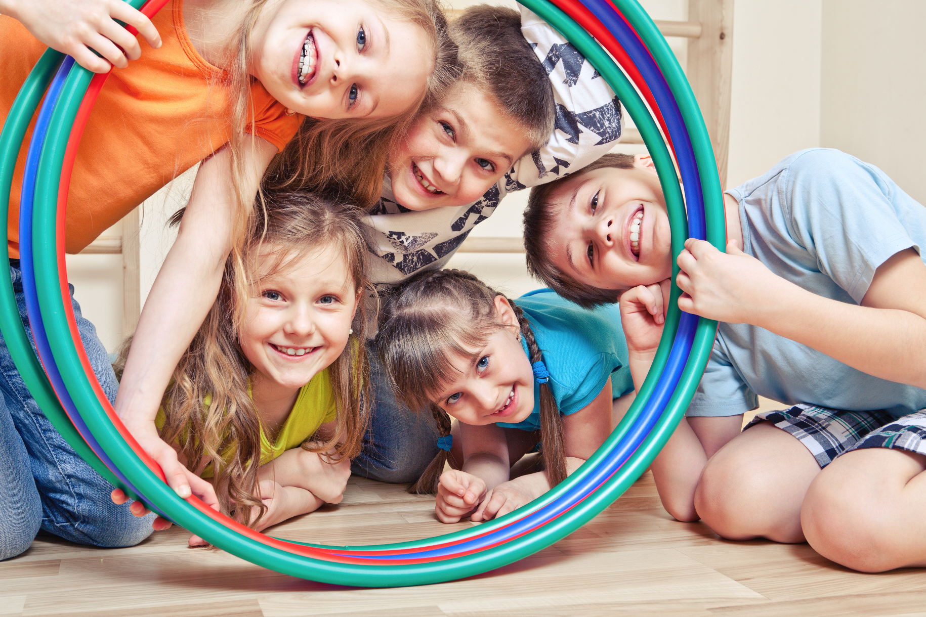 kids playing with hula hoop