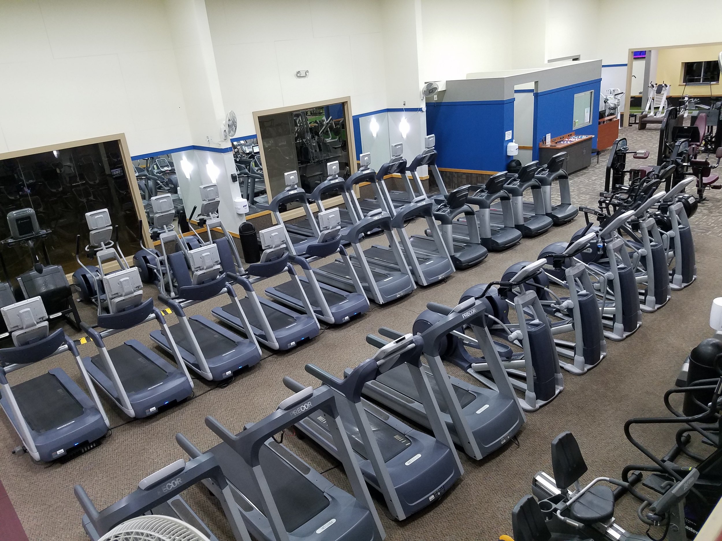 aerial view of room with treadmills