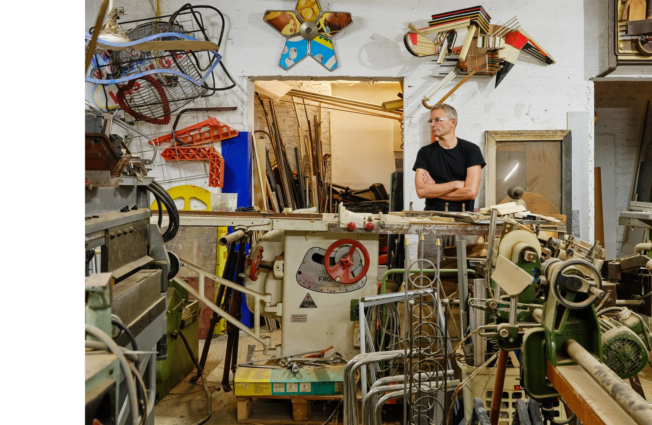 Portrait photography of artist Karsten Konrad in his studio in Berlin by Christoph Musiol