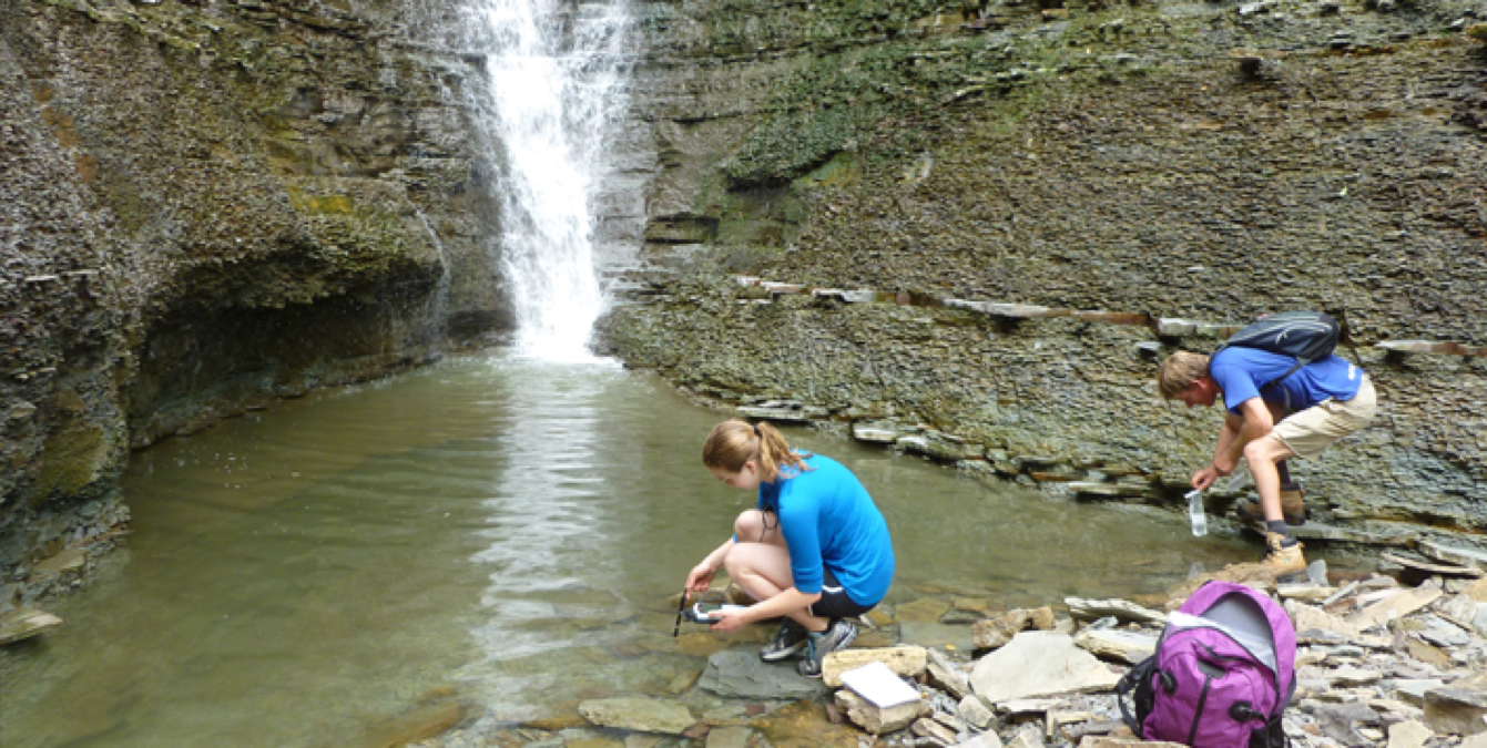 Students taking water samples