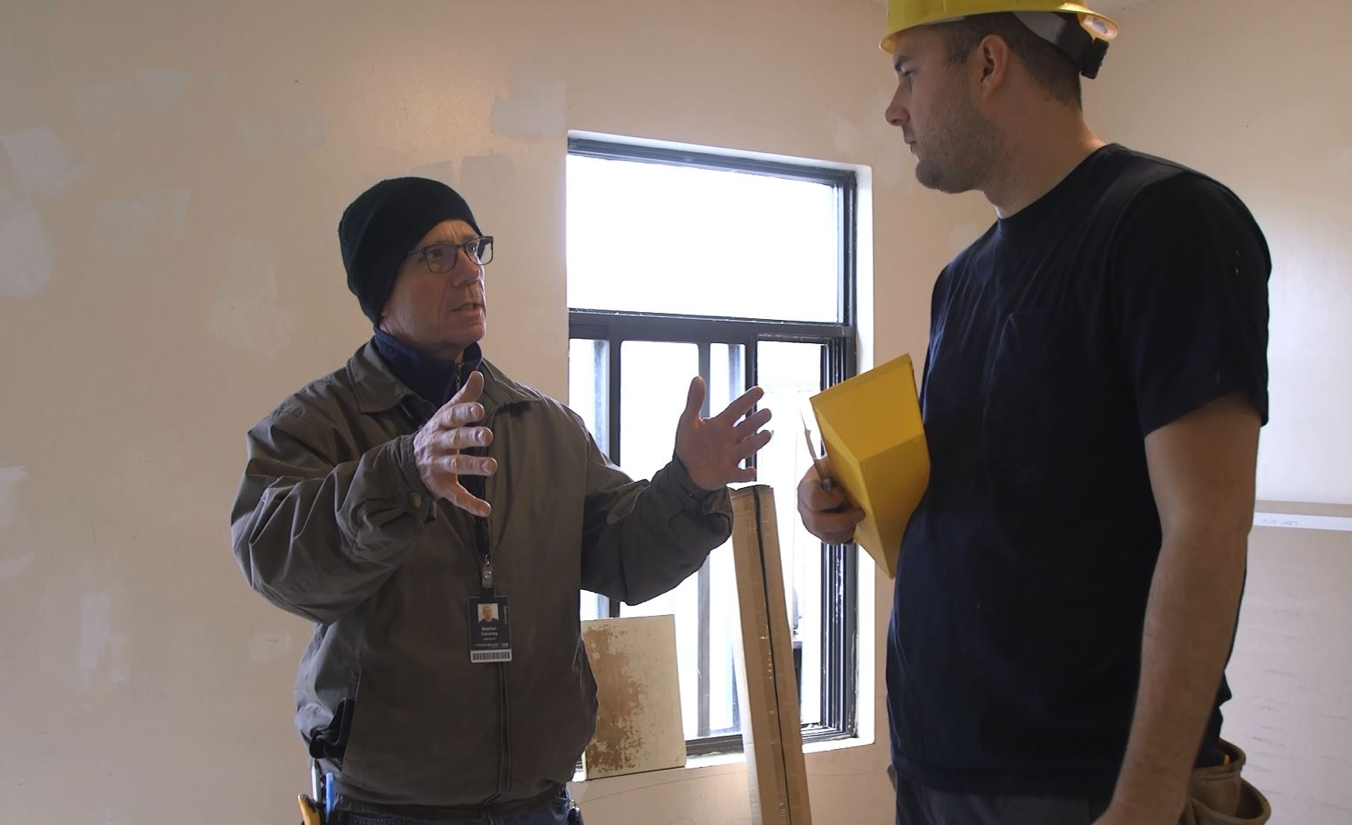 Mohawk instructor teaching a student on-site