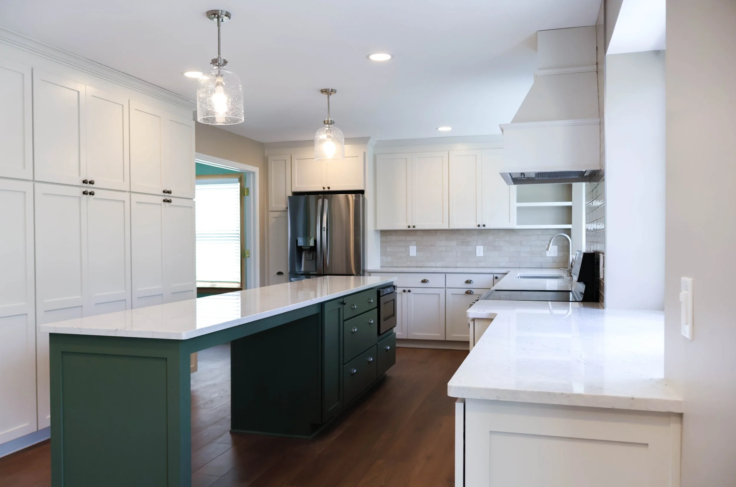 Kitchen Remodel with White Cabinets and Forest Green Custom Island