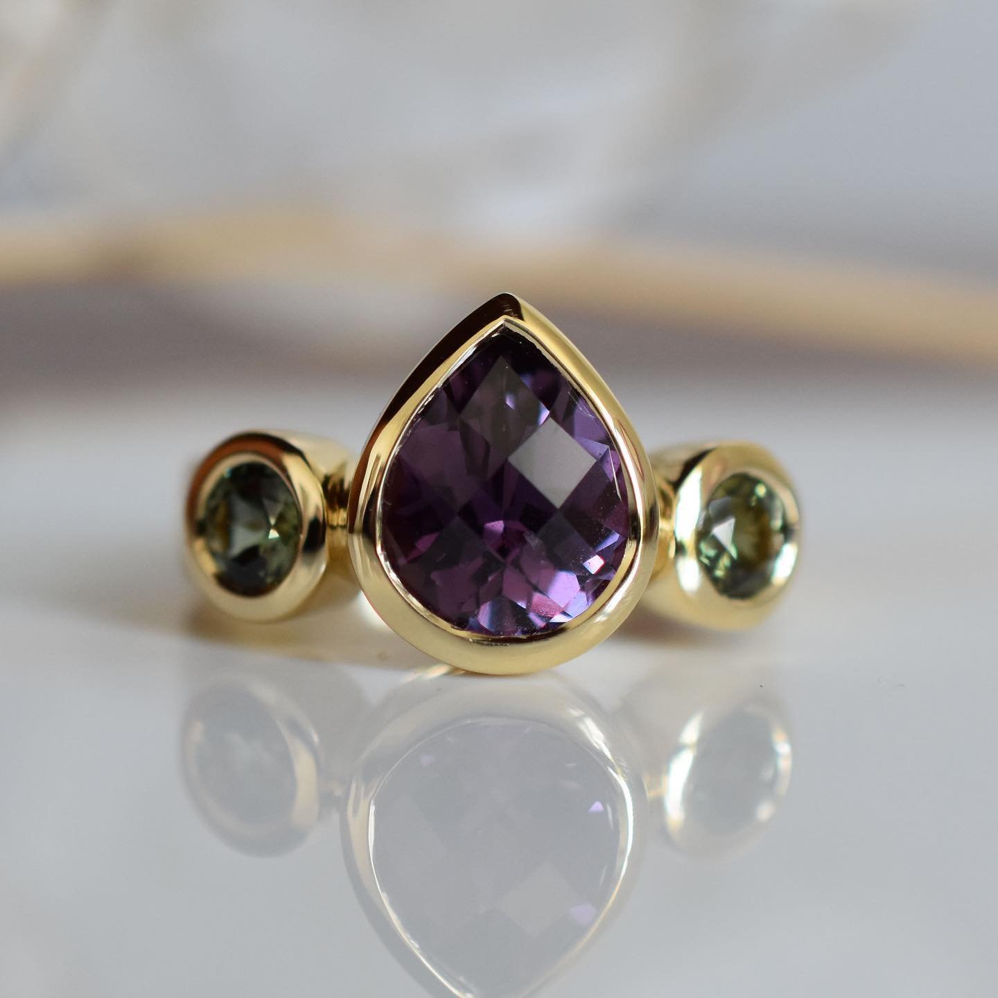 My new spring goodies are starting to roll out and this is the ring I&rsquo;m most excited about. I found that centre stone in Tucson. She&rsquo;s my favourite shape ( a pear) but she&rsquo;s also my favourite kind of pear ( a fat one)
She&rsquo;s a 