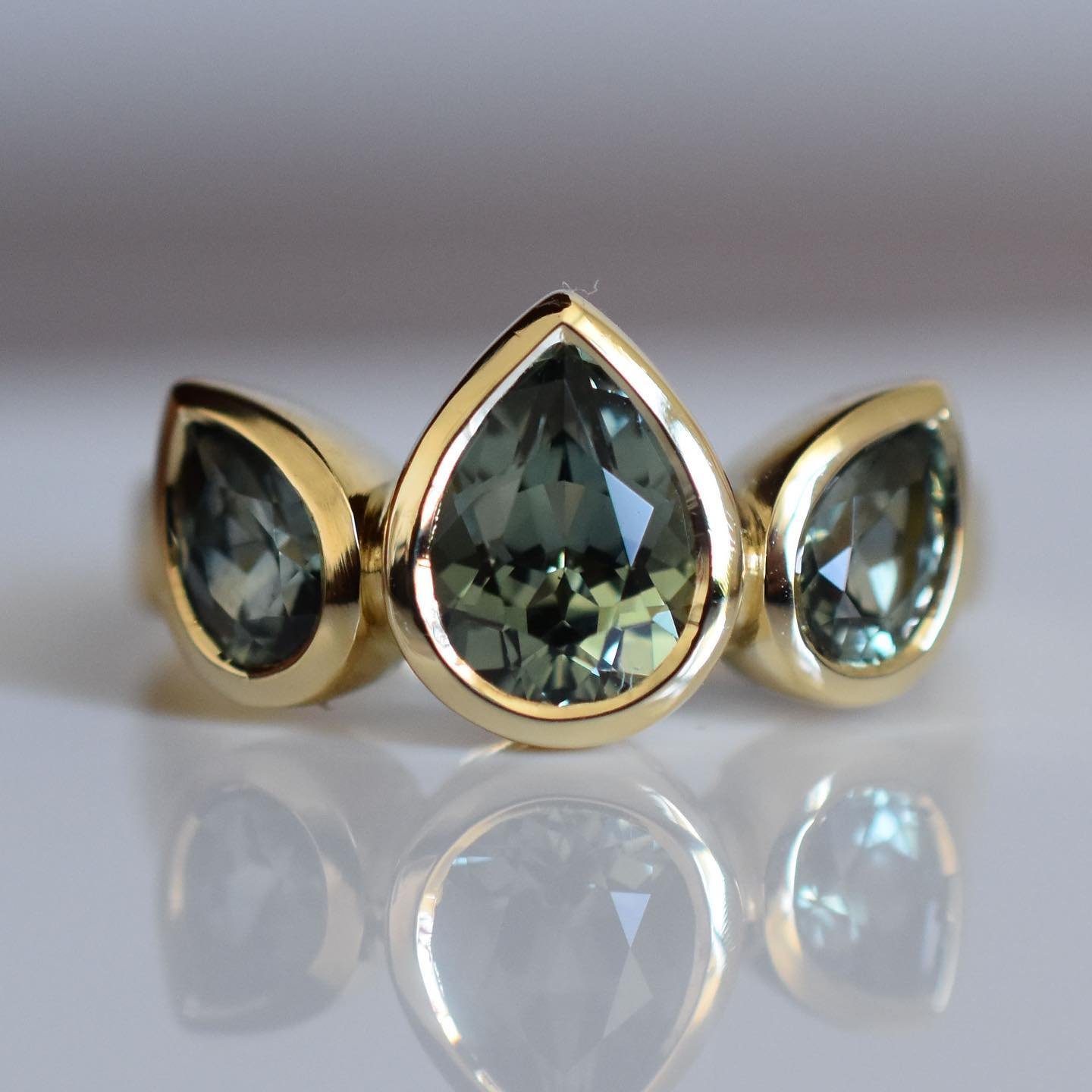 Brand new triple green pear Pallenberg ring ✨✨✨ thought I&rsquo;d switch things up and use these incredible Australian origin green sapphires. What do you think? 
She&rsquo;s available, but not online yet. Please email or DM
😘😘😘
.
.
.
#greensapphi