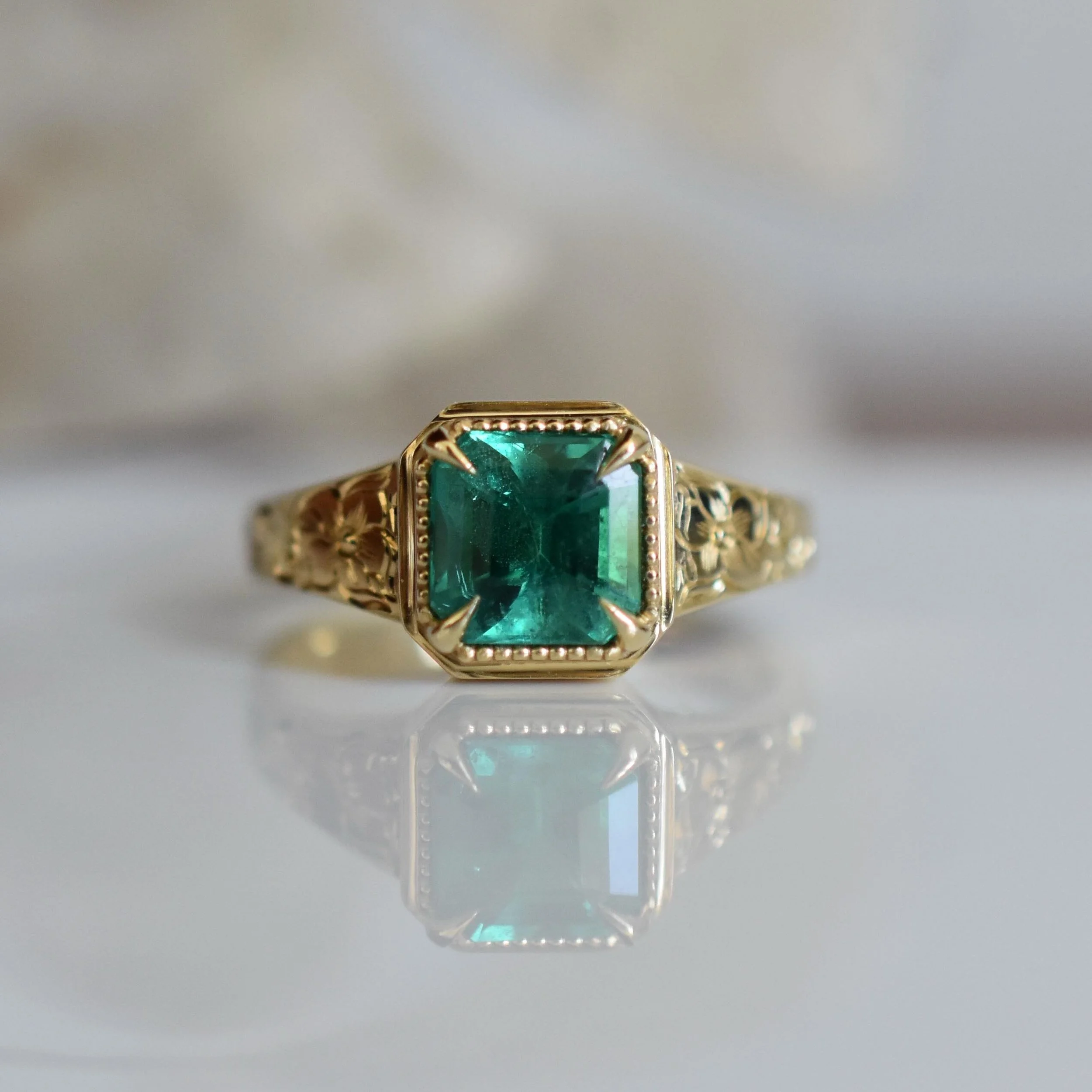 Meet Josie ✨✨
Ultra pretty 1.42ct GIA certified F2 emerald set in 18k gold with hand engraving.  Scroll to see her in the outside light. She&rsquo;s extra glowy ✨
She is currently available, please DM for details 😘💛
