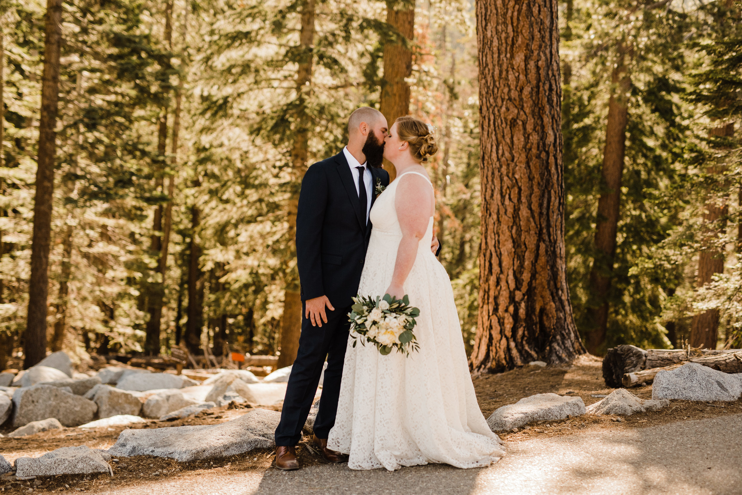 Bride and Groom on a trail at Yosemite Elopement