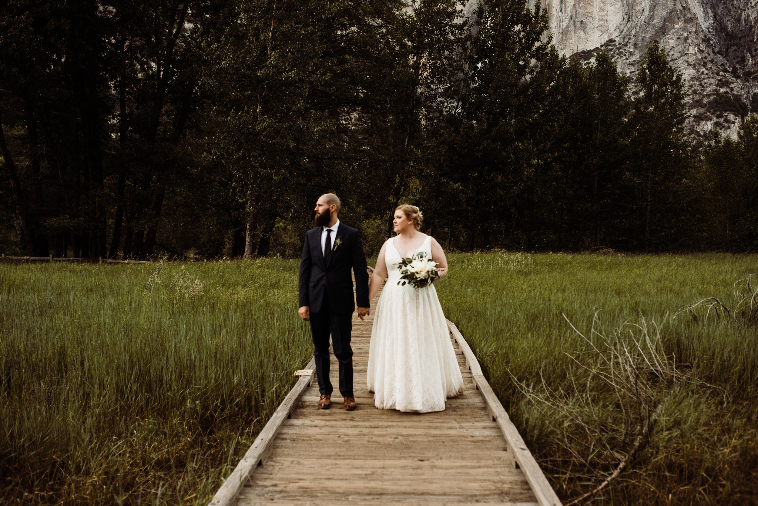 Adventurous couple exploring Yosemite Valley after their elopement ceremony