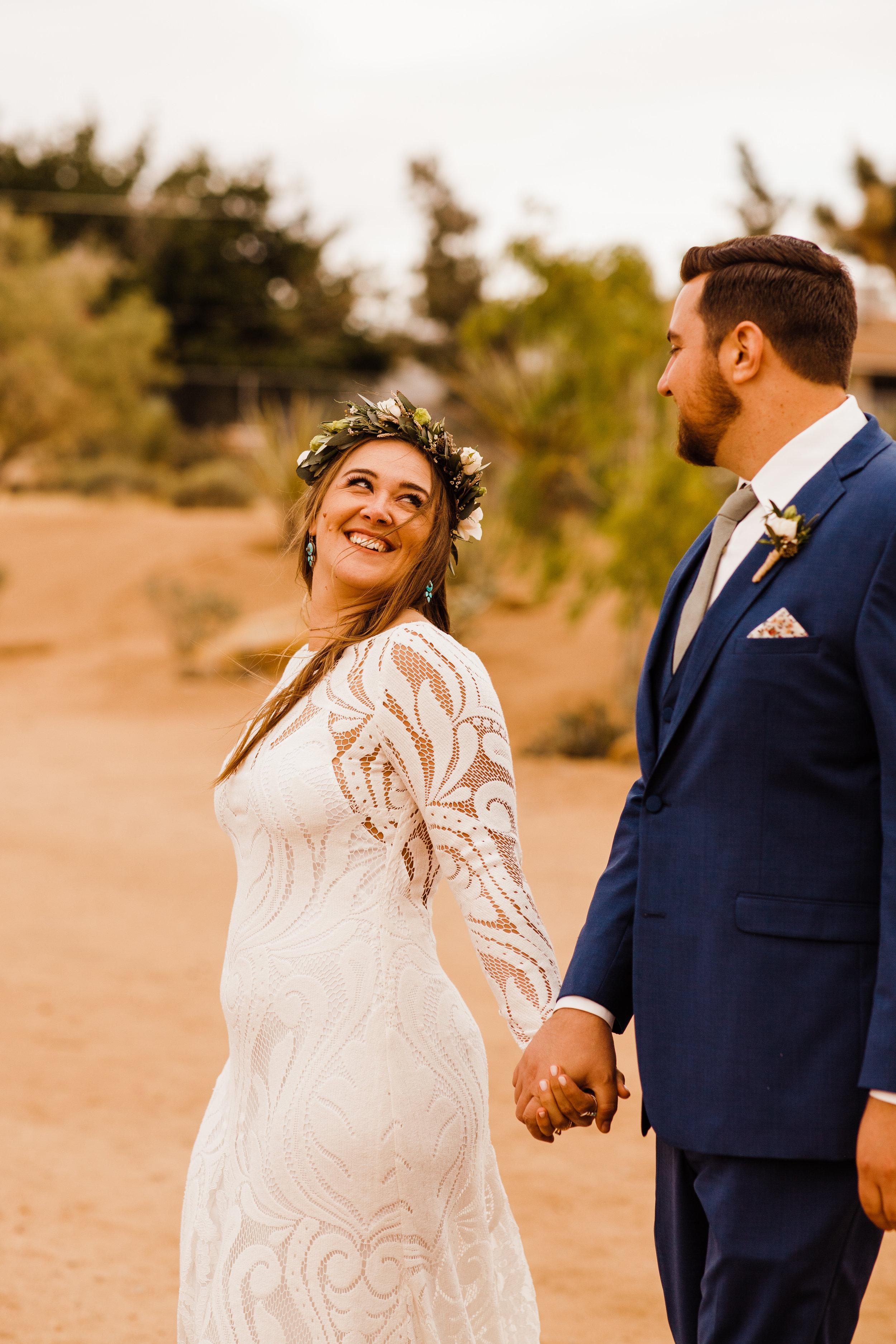 Tumbleweed Sanctuary Wedding - Joshua Tree, CA - Kristy + Chris couples portraits with Hawaiian flower crown