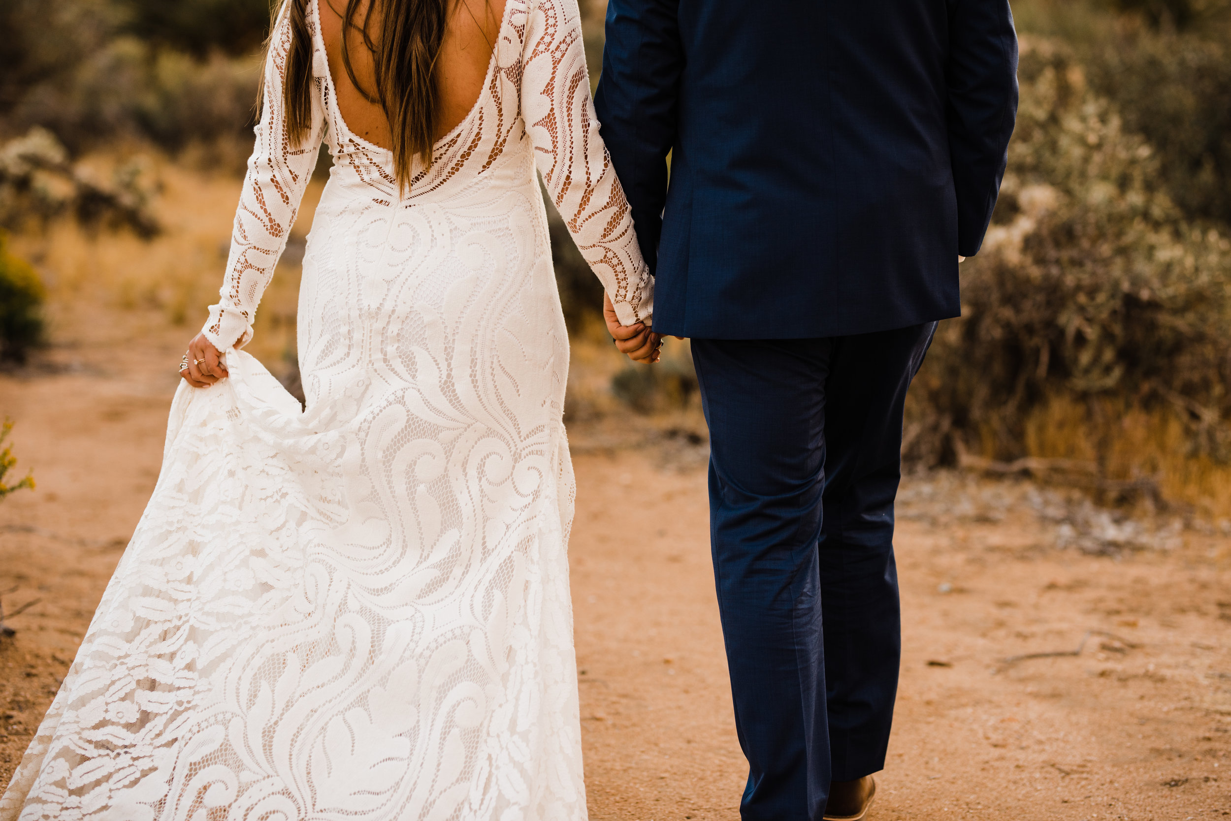 bride and groom detail shot of lovers society dress