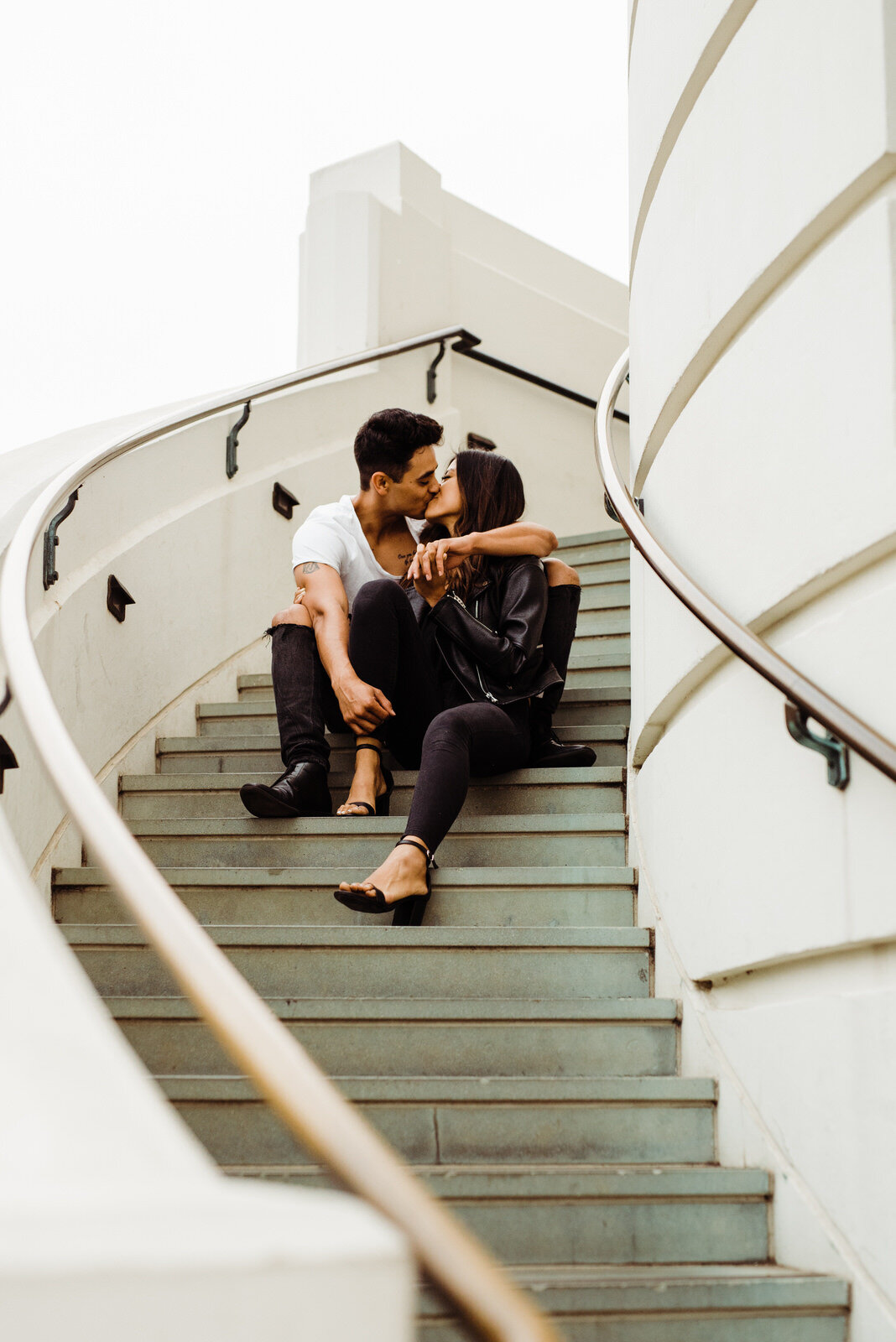 Couple Kiss on Griffith Observatory Staircase in Los Angeles, California