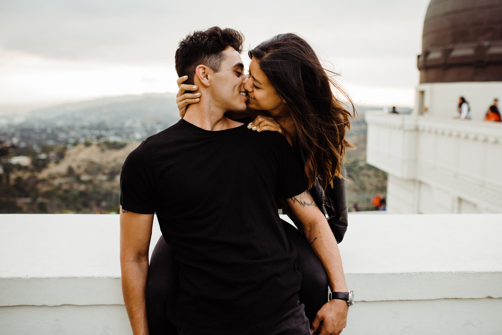 Dark and Moody Engagement Photos in Los Angeles, California at Griffith Observatory with Telescope in background