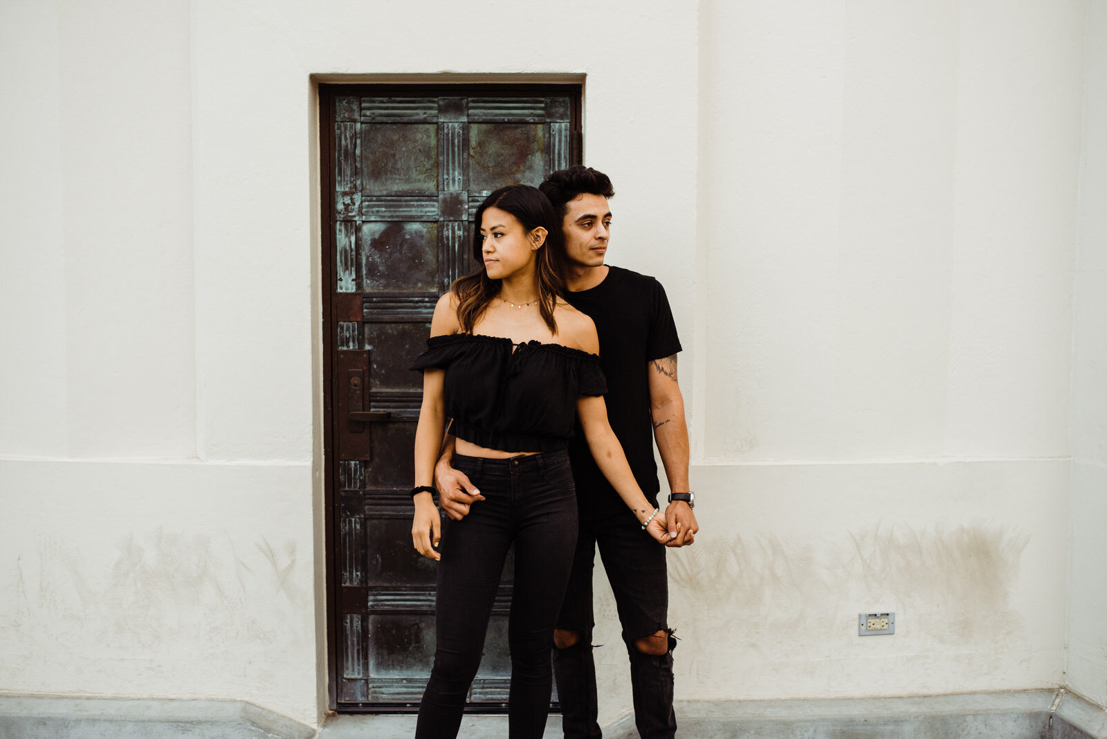 Dark and Moody couples portraits during engagement session in Griffith Observatory