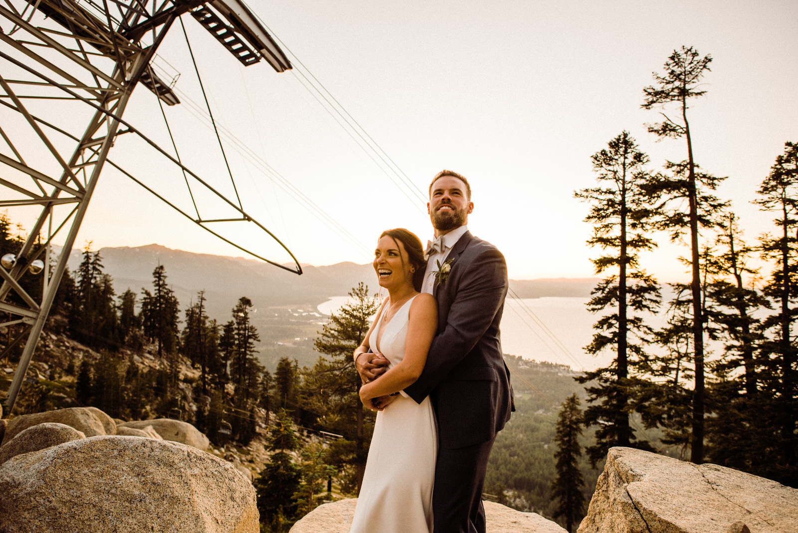 Couple smiles in front of Heavenly Gondola at South Lake Tahoe Lakeview Lodge