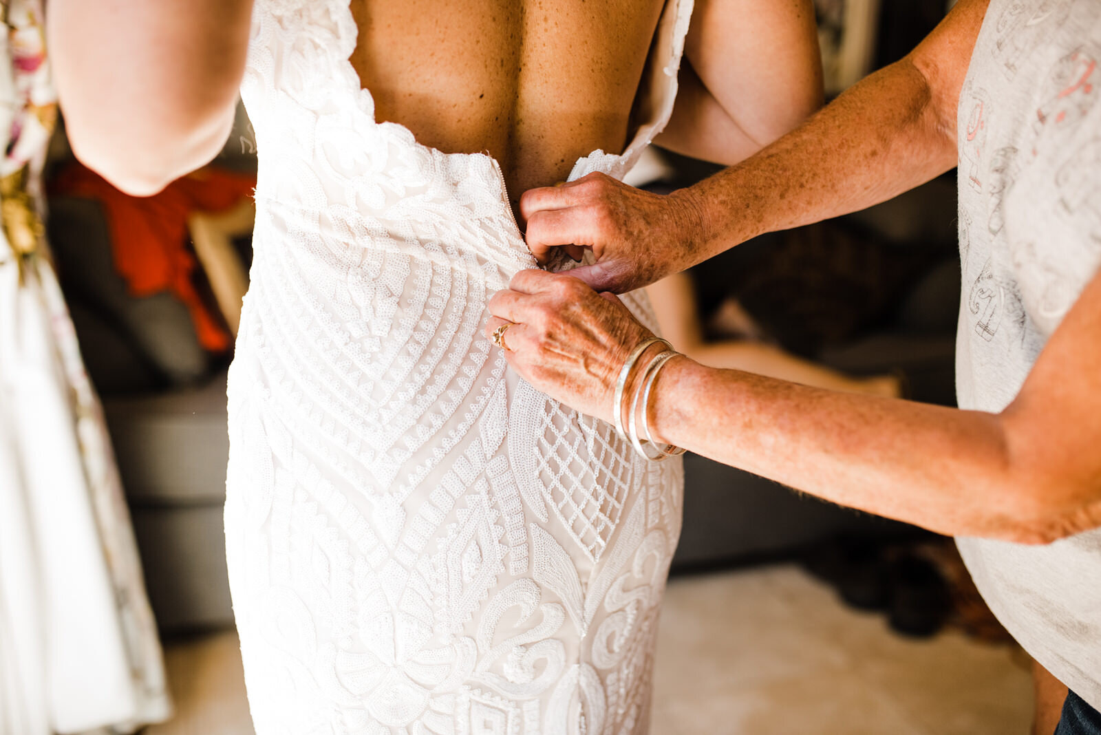 Bride getting ready at Houdini Estate - Mom zipping Blush by Hayley Paige Wedding Dress | Candid, documentary wedding photos by LA Wedding Photographer Kept Record | www.keptrecord.com