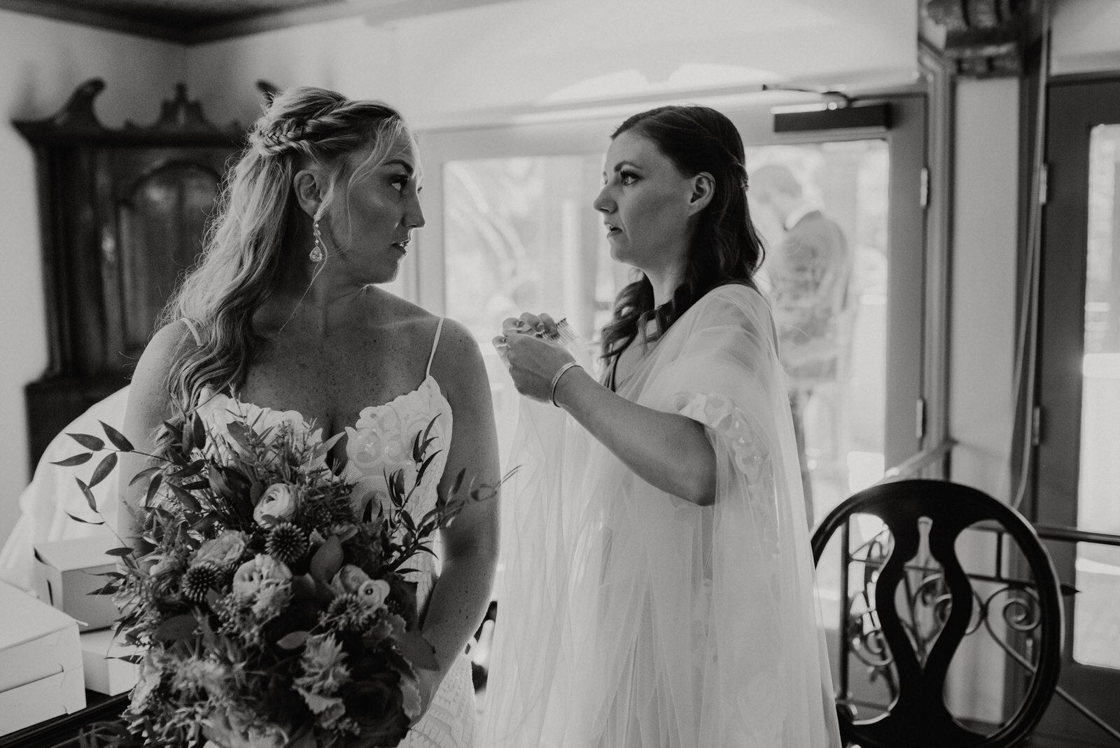 Bride puts in Hayley Paige wedding veil