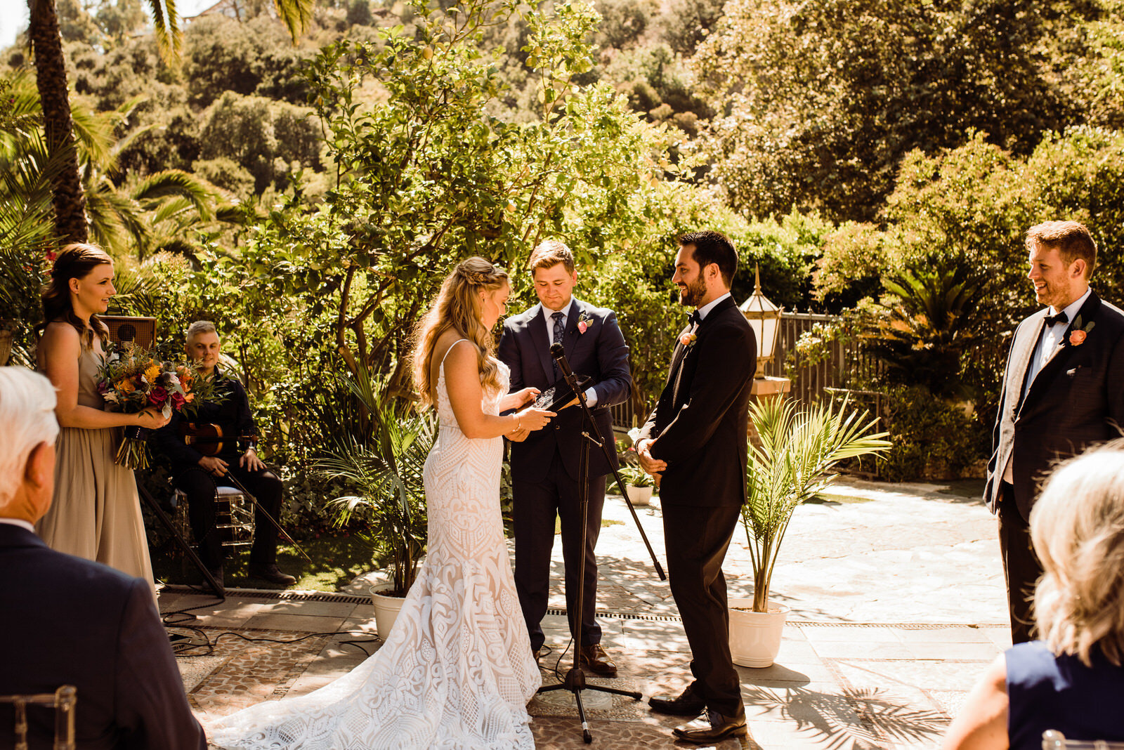 Bride and groom exchange custom vows at Houdini Estate Ceremony