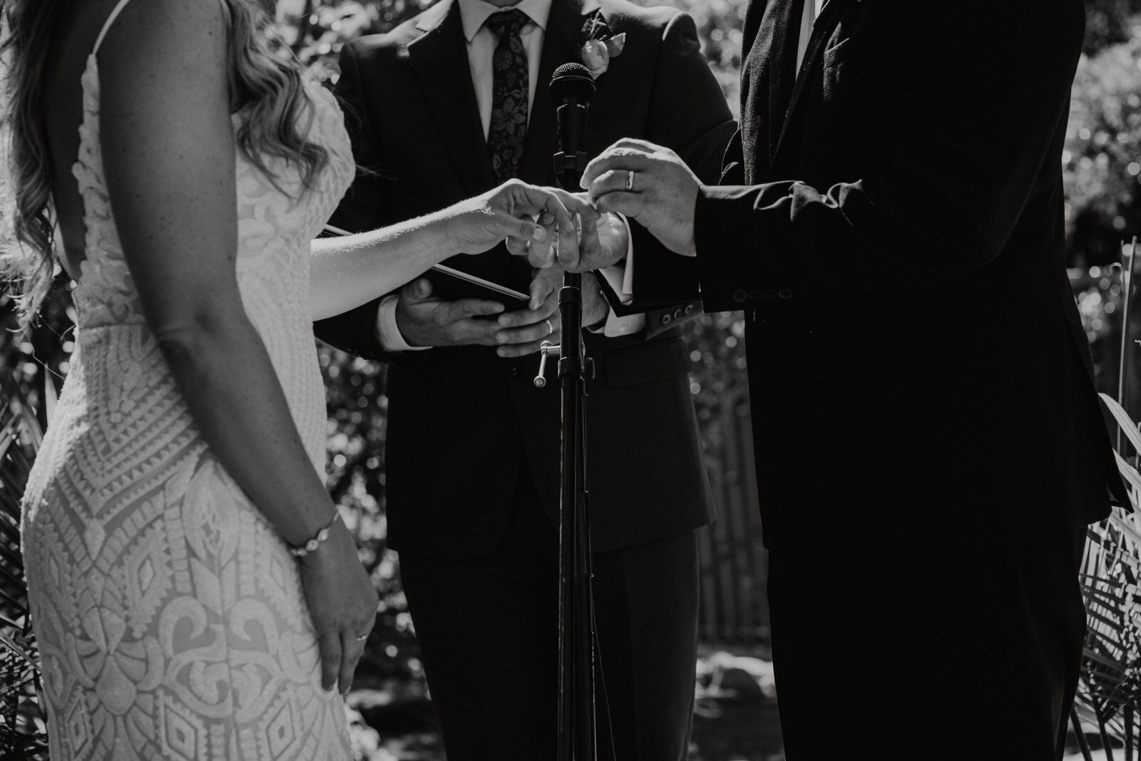 Groom gives bride ring at Houdini Estate Wedding Ceremony