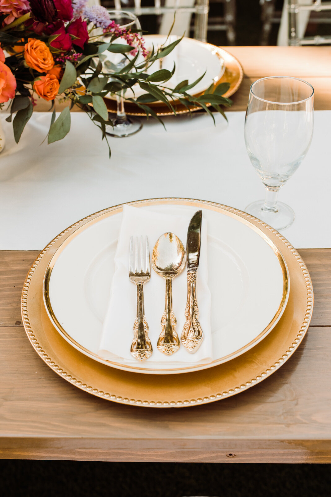 Gold place settings at Summer Houdini Estate Wedding 