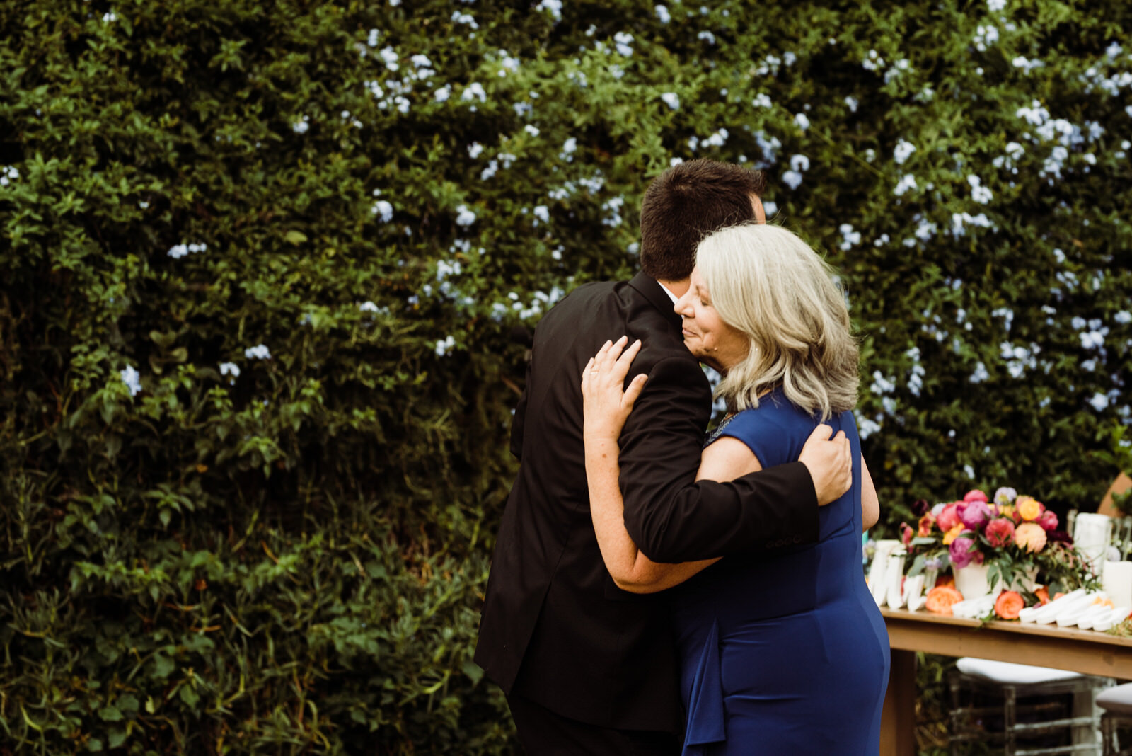 Mother and groom hugging at Houdini Estate