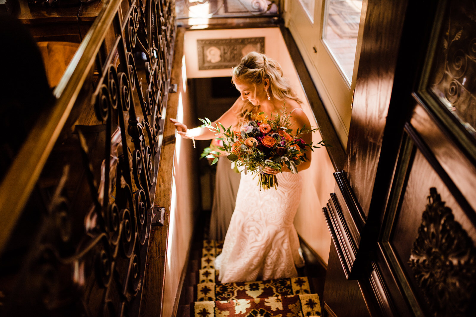 Bride in Hayley Paige wedding dress with Wildflora Design bouquet walking at Houdini Estate